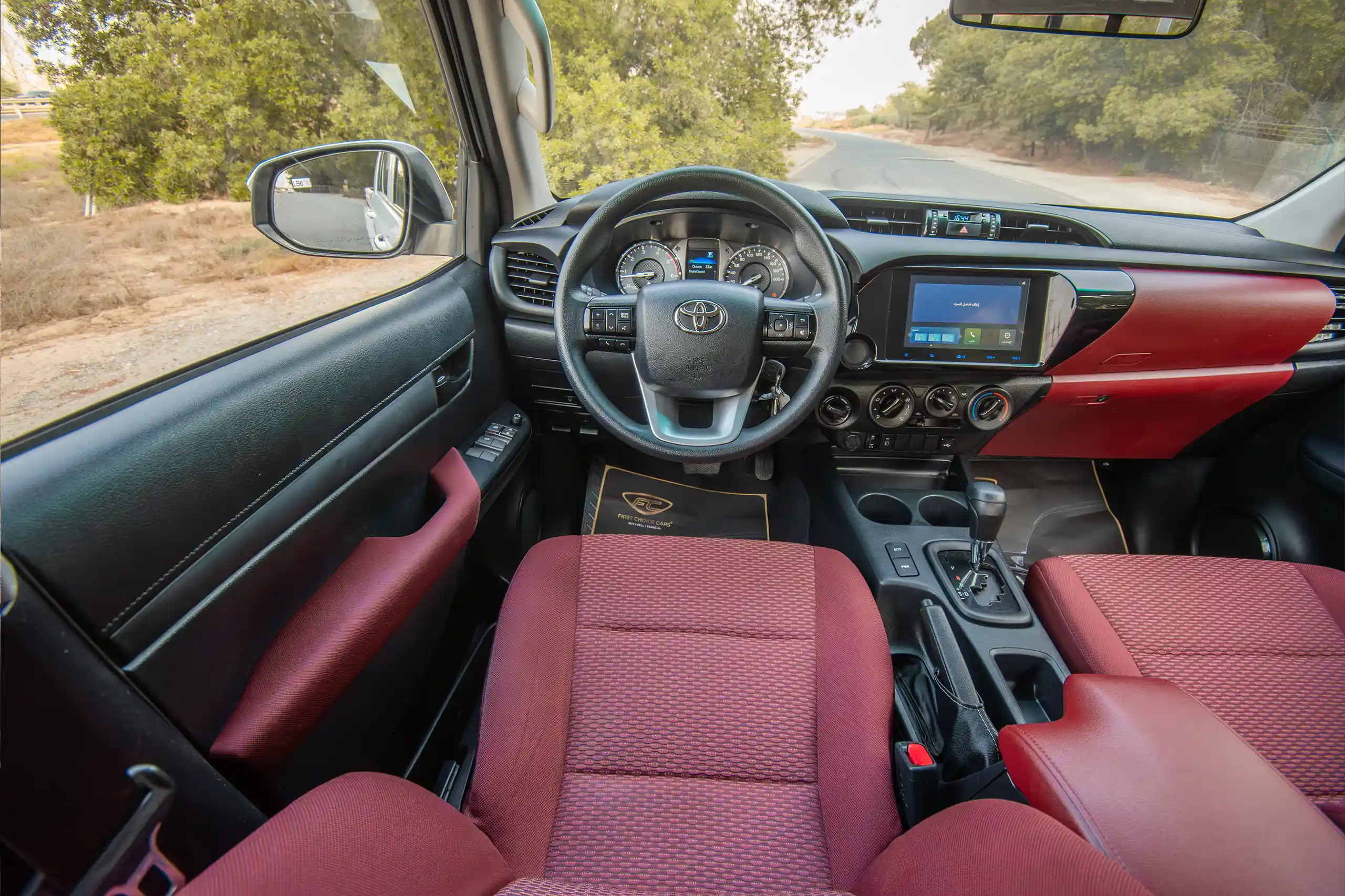 Used 2024 Toyota Hilux Dlx Double Cabin White – Steering Wheel & Instrument Cluster at First Choice Cars Sharjah