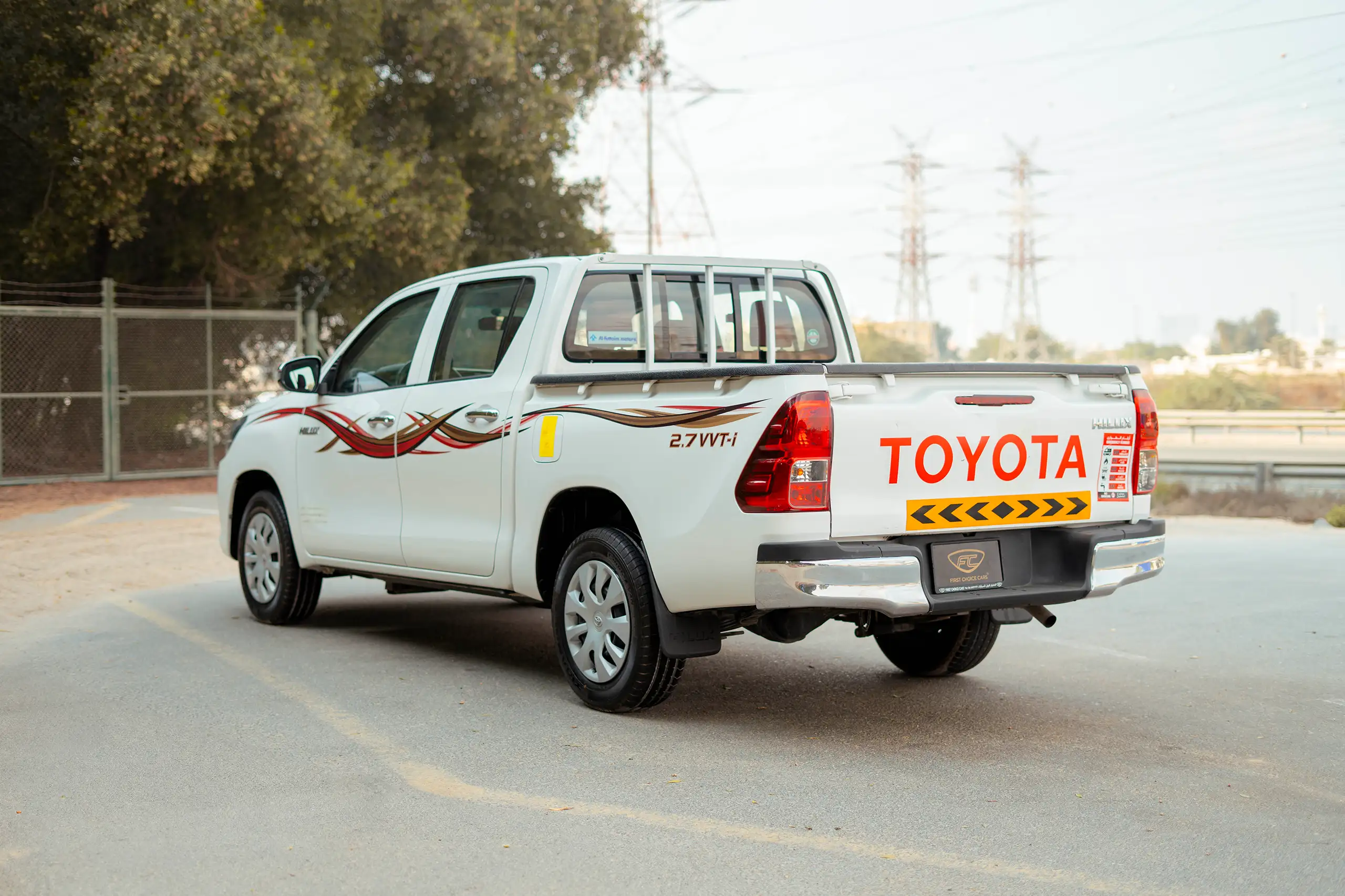 Used 2022 Toyota Hilux GLX Double Cabin White – Left Back Diagonal (45°) View at First Choice Cars Sharjah