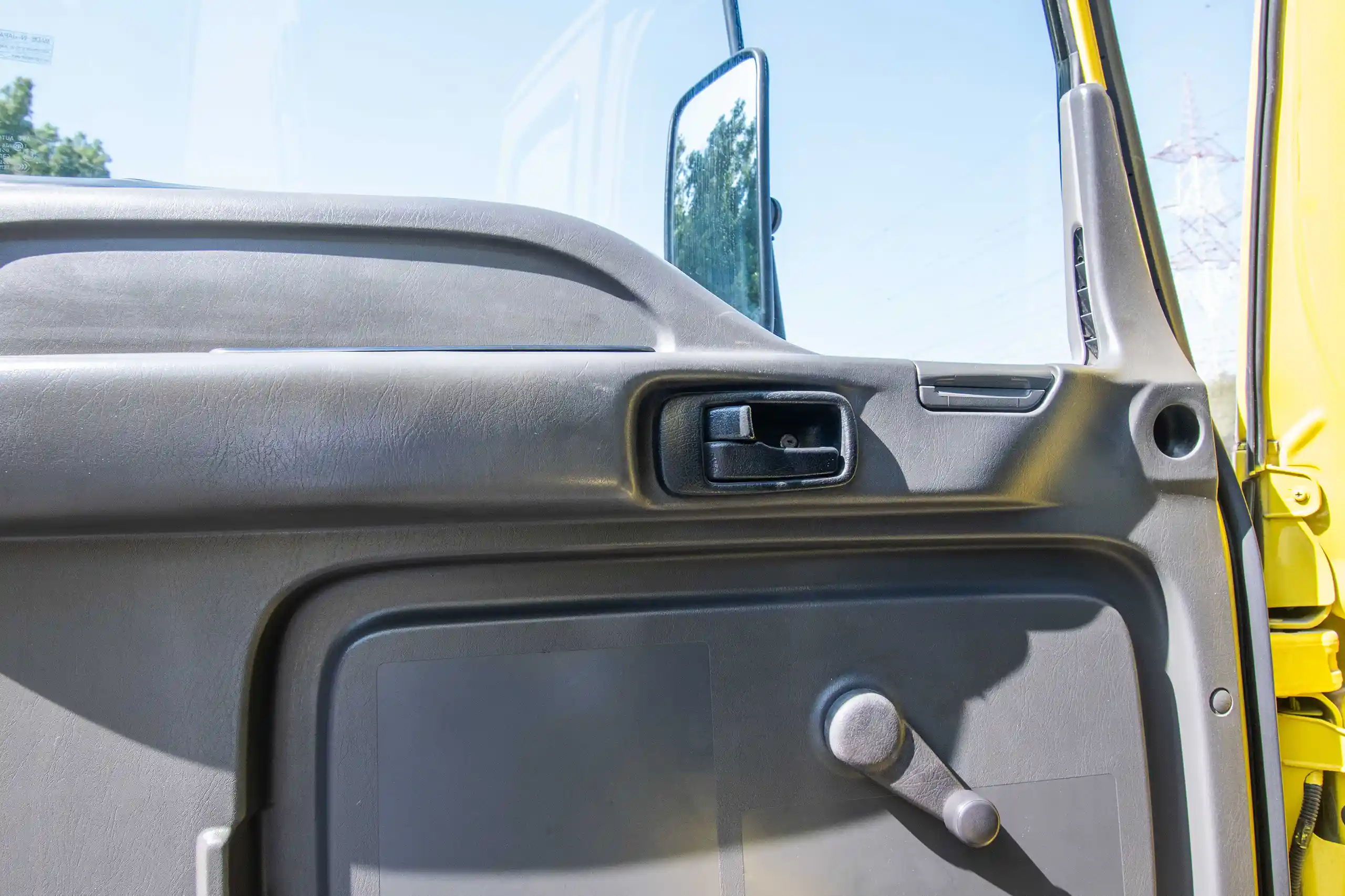 Used 2016 Isuzu FSR Cargo Truck Yellow – Driver Door Panel Full View at First Choice Cars Sharjah