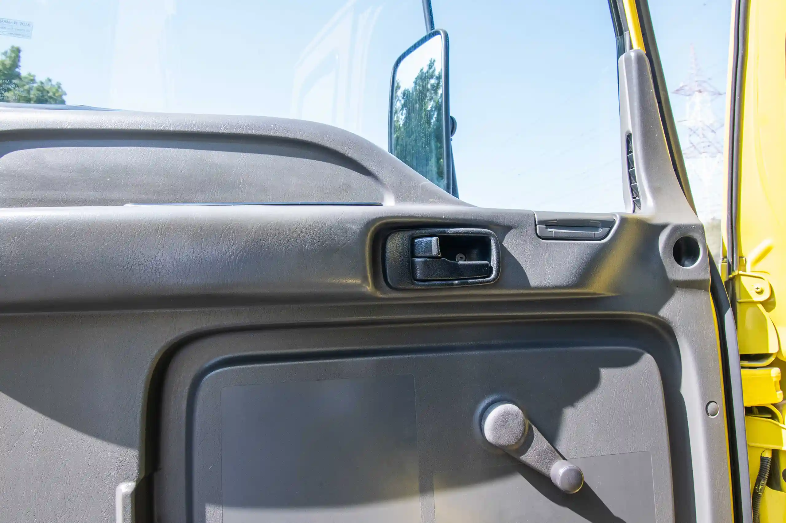 Used 2016 Isuzu FSR Cargo Truck Yellow – Driver Door Panel Full View at First Choice Cars Sharjah