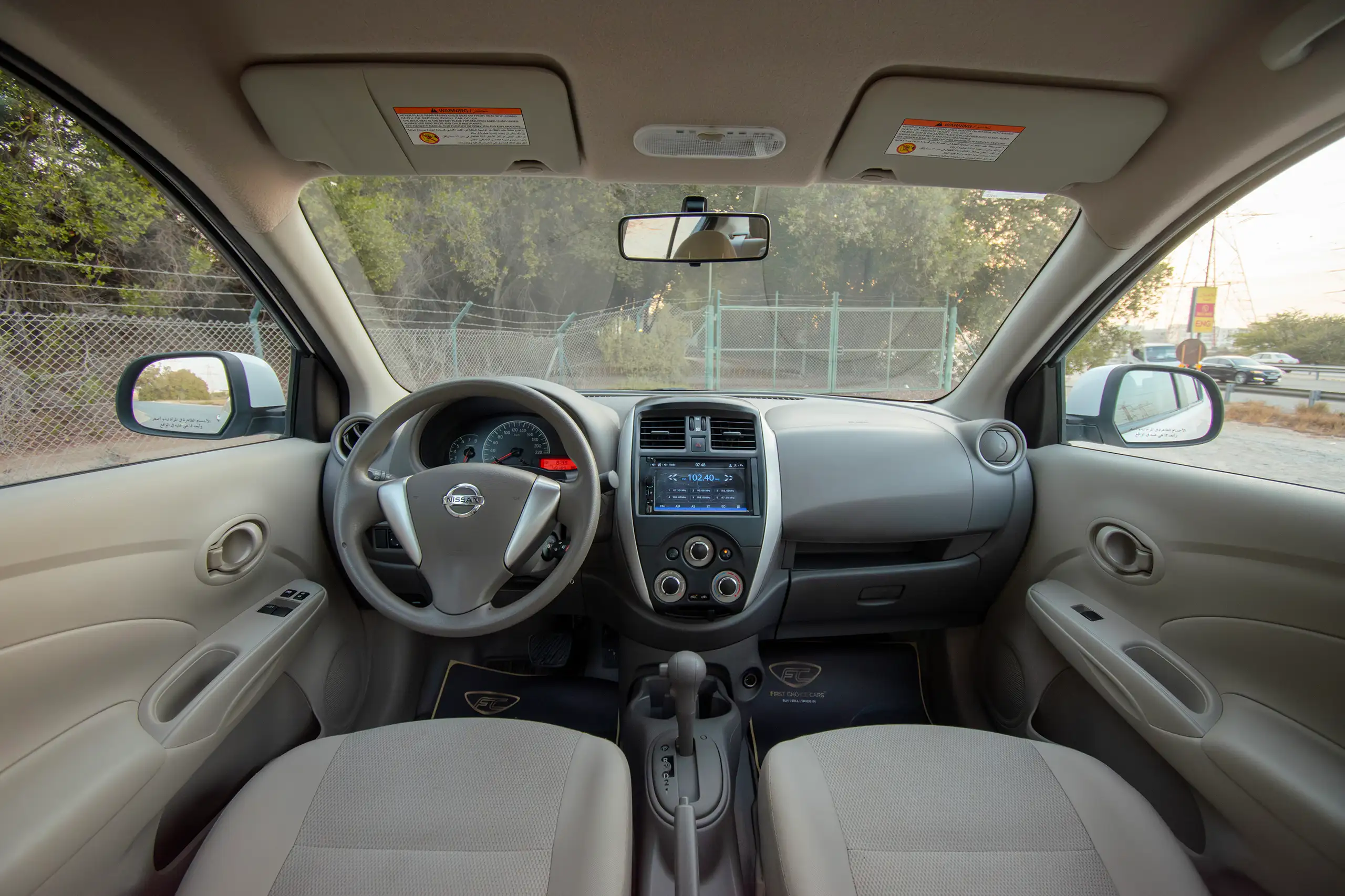 Used 2023 Nissan Sunny SV White – Front Cabin / Dashboard Full View at First Choice Cars Sharjah