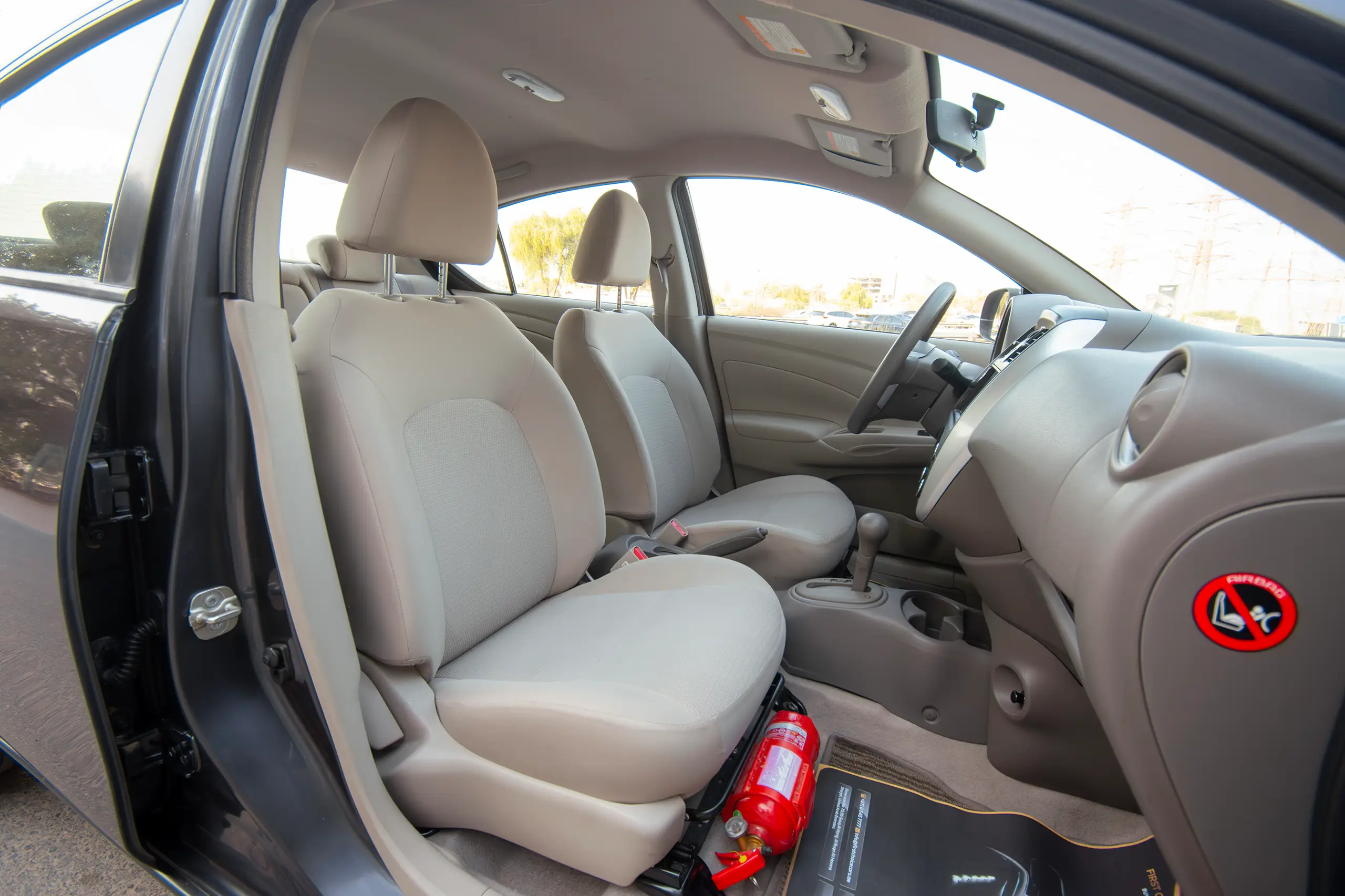 Used 2023 Nissan Sunny SV Grey – Front Passenger Side Cabin View at First Choice Cars Sharjah