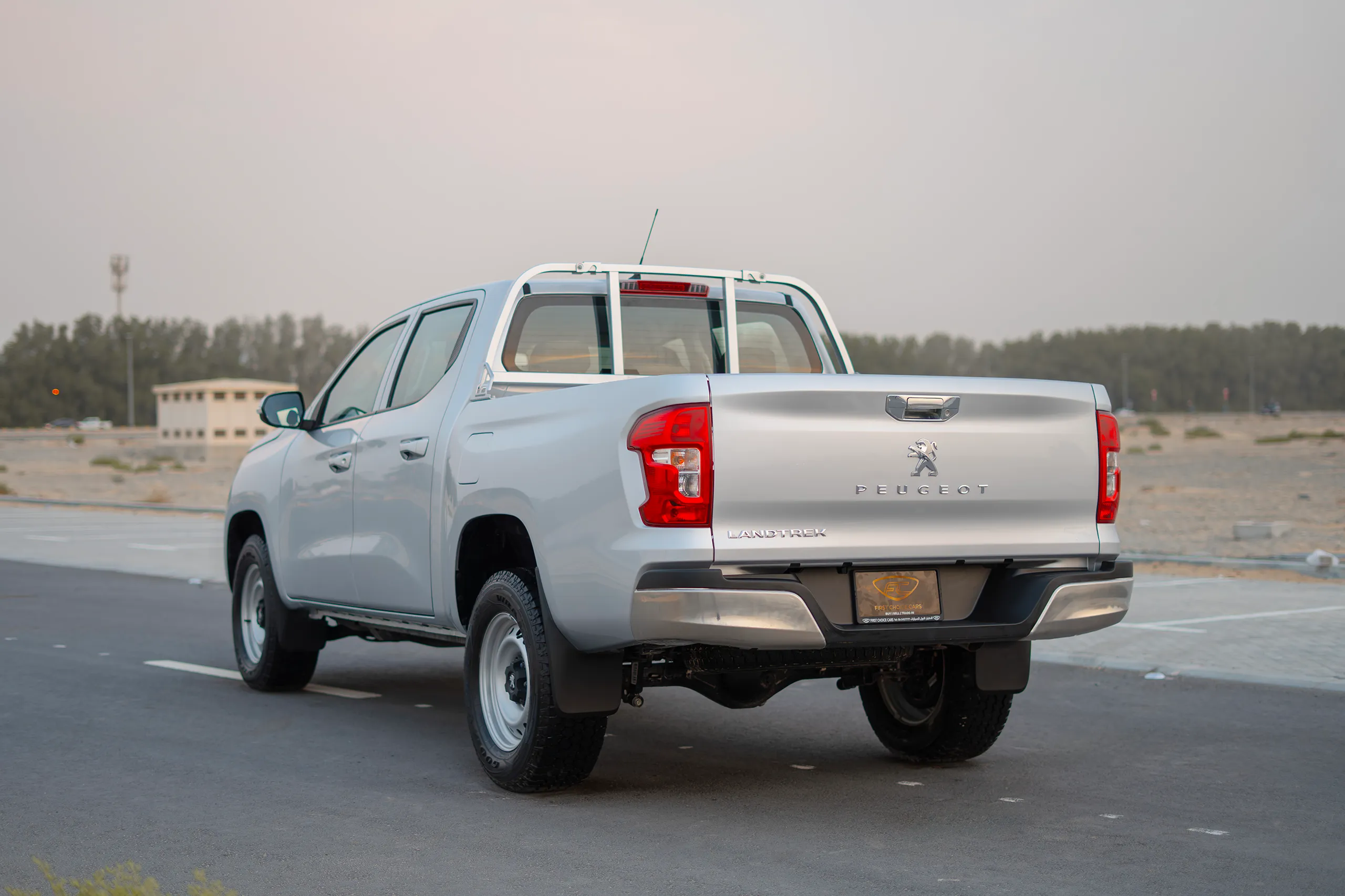 Used 2023 Peugeot Landtrek Double Cabin Silver – Left Back Diagonal (45°) View at First Choice Cars Sharjah