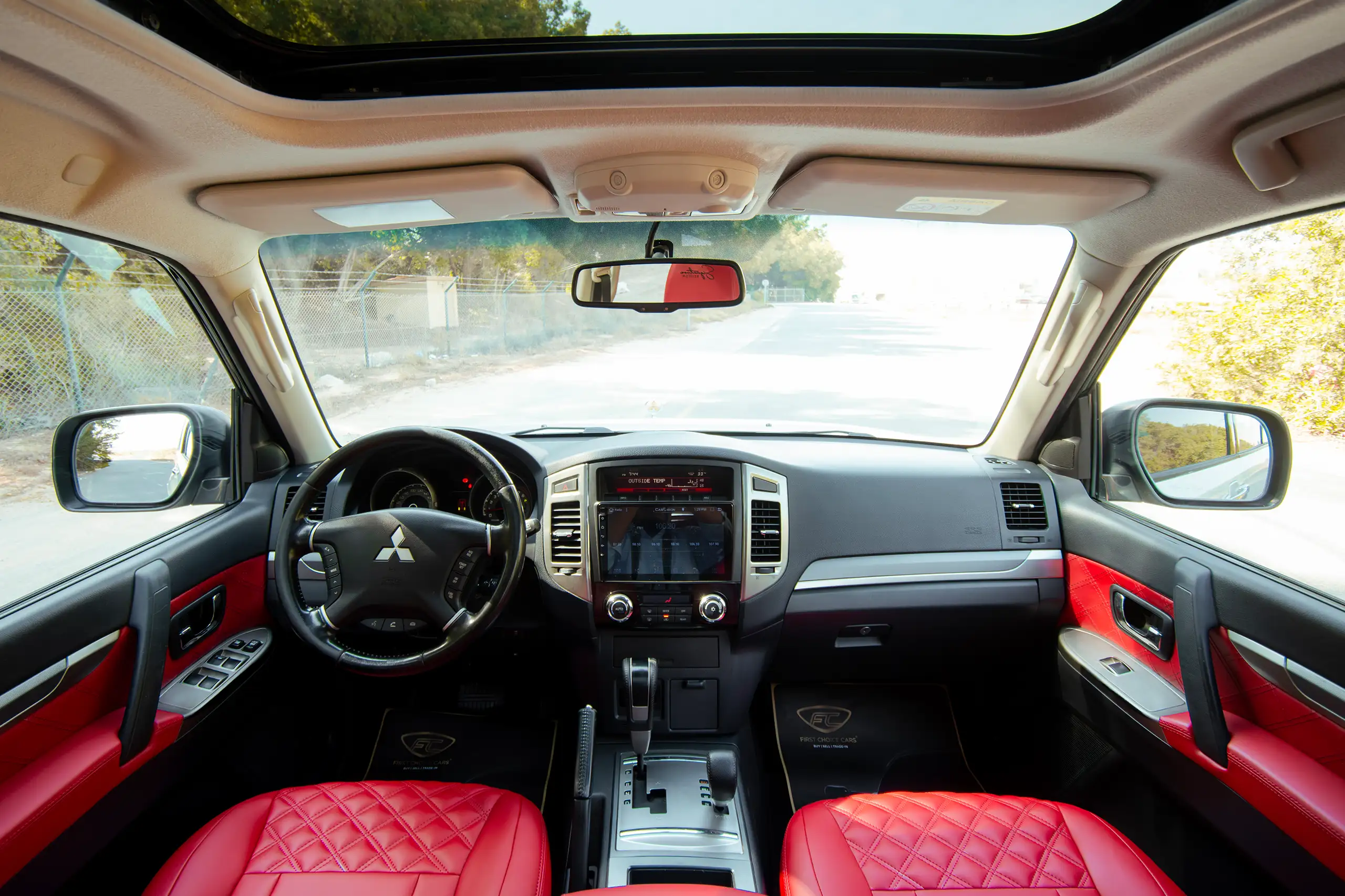 Used 2022 Mitsubishi Pajero GLS White – Front Cabin / Dashboard Full View at First Choice Cars Sharjah