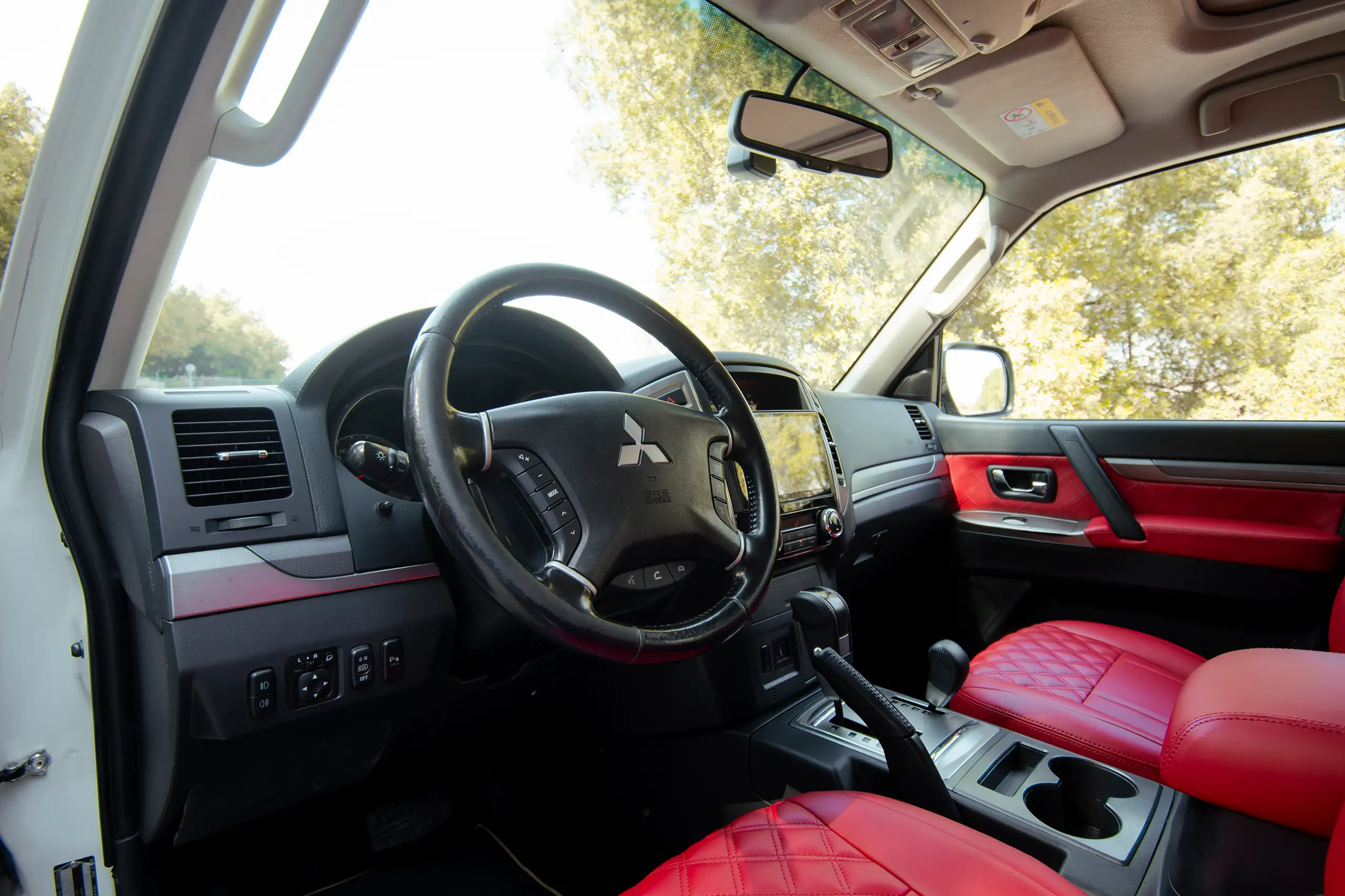 Used 2022 Mitsubishi Pajero GLS White – Driver Side Dashboard & Steering View at First Choice Cars Sharjah