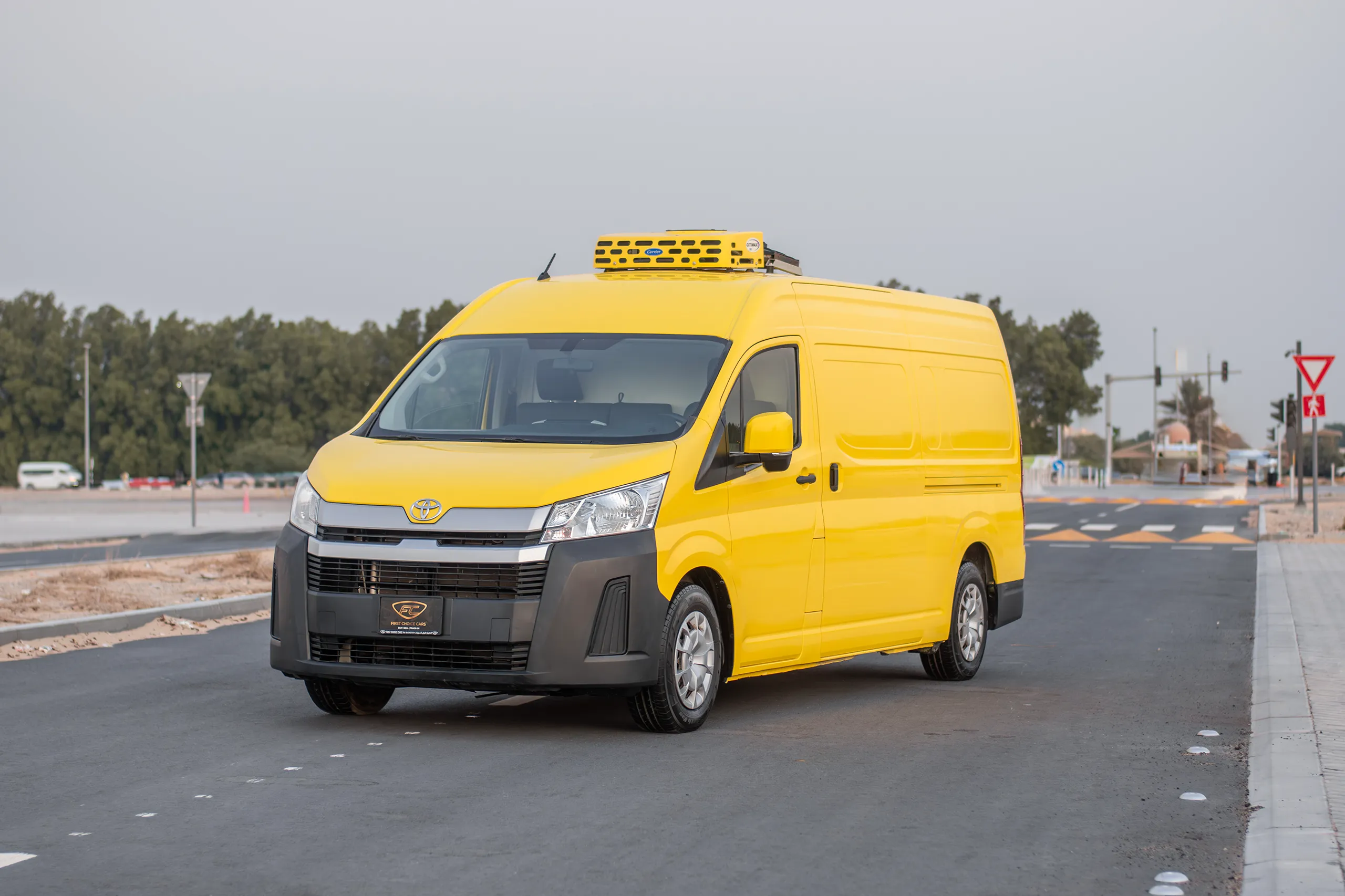 Used 2020 Toyota Hiace GL- High Roof Yellow – Left Front Diagonal (45°) View at First Choice Cars Sharjah