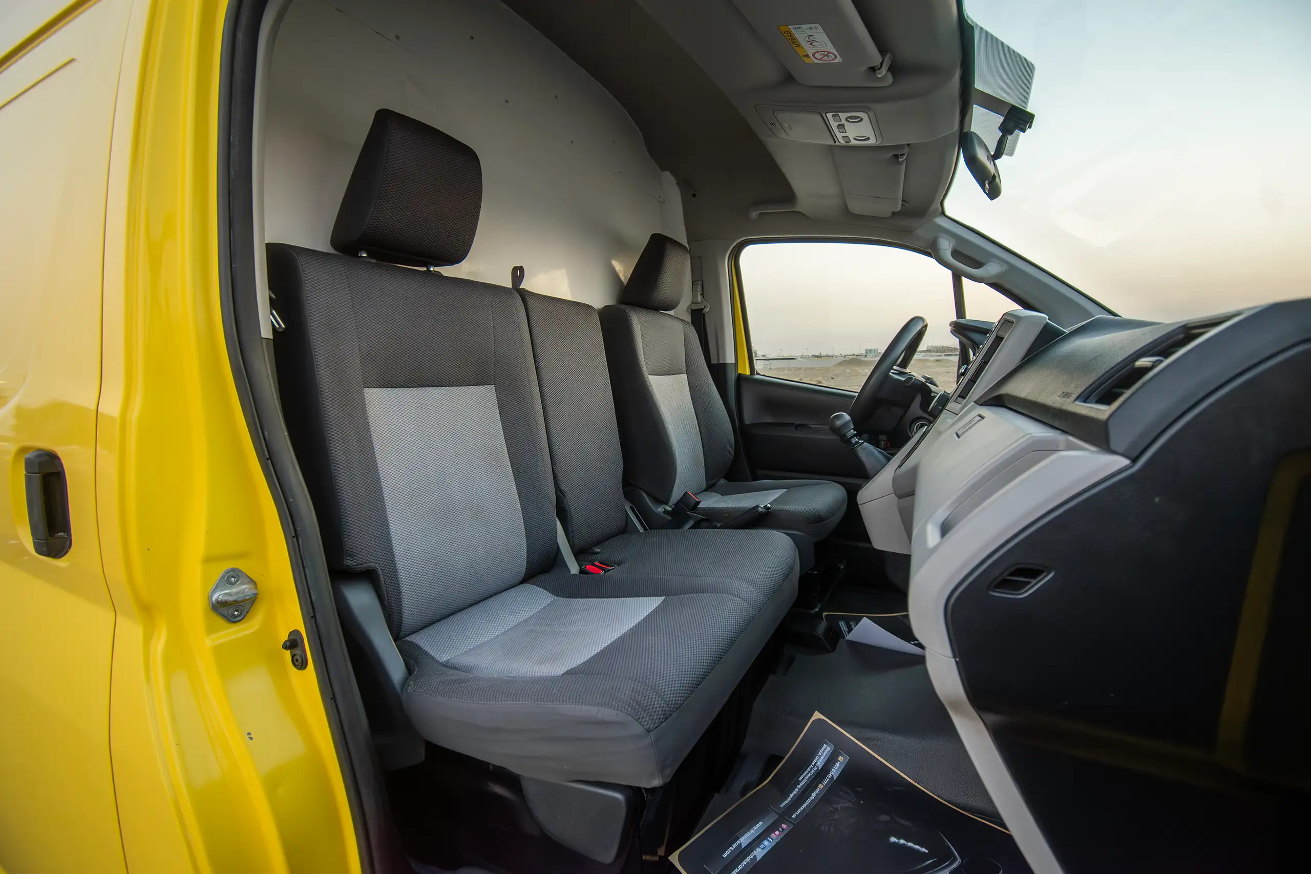 Used 2020 Toyota Hiace GL- High Roof Yellow – Front Passenger Side Cabin View at First Choice Cars Sharjah