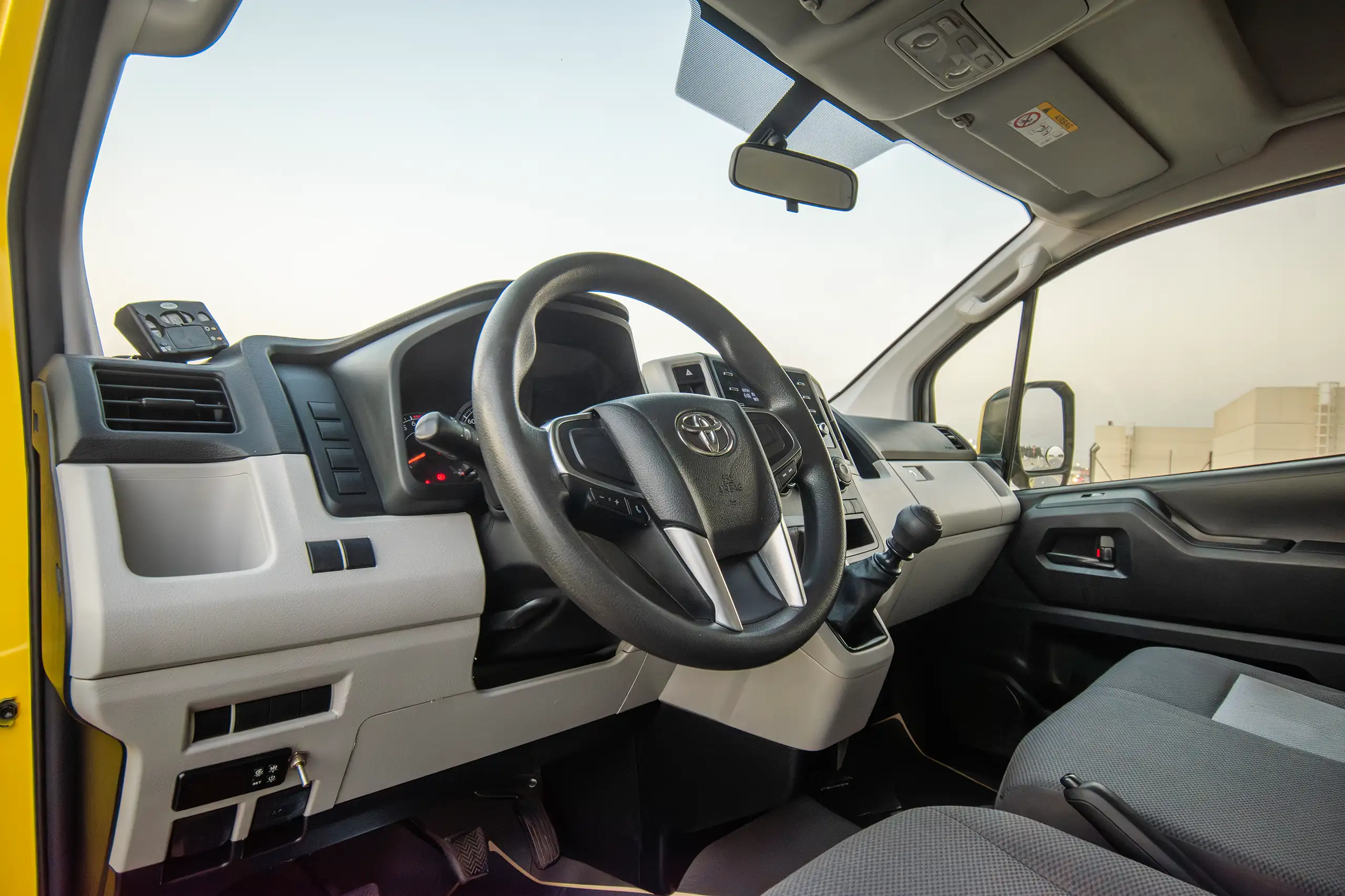 Used 2020 Toyota Hiace GL- High Roof Yellow – Driver Side Dashboard & Steering View at First Choice Cars Sharjah