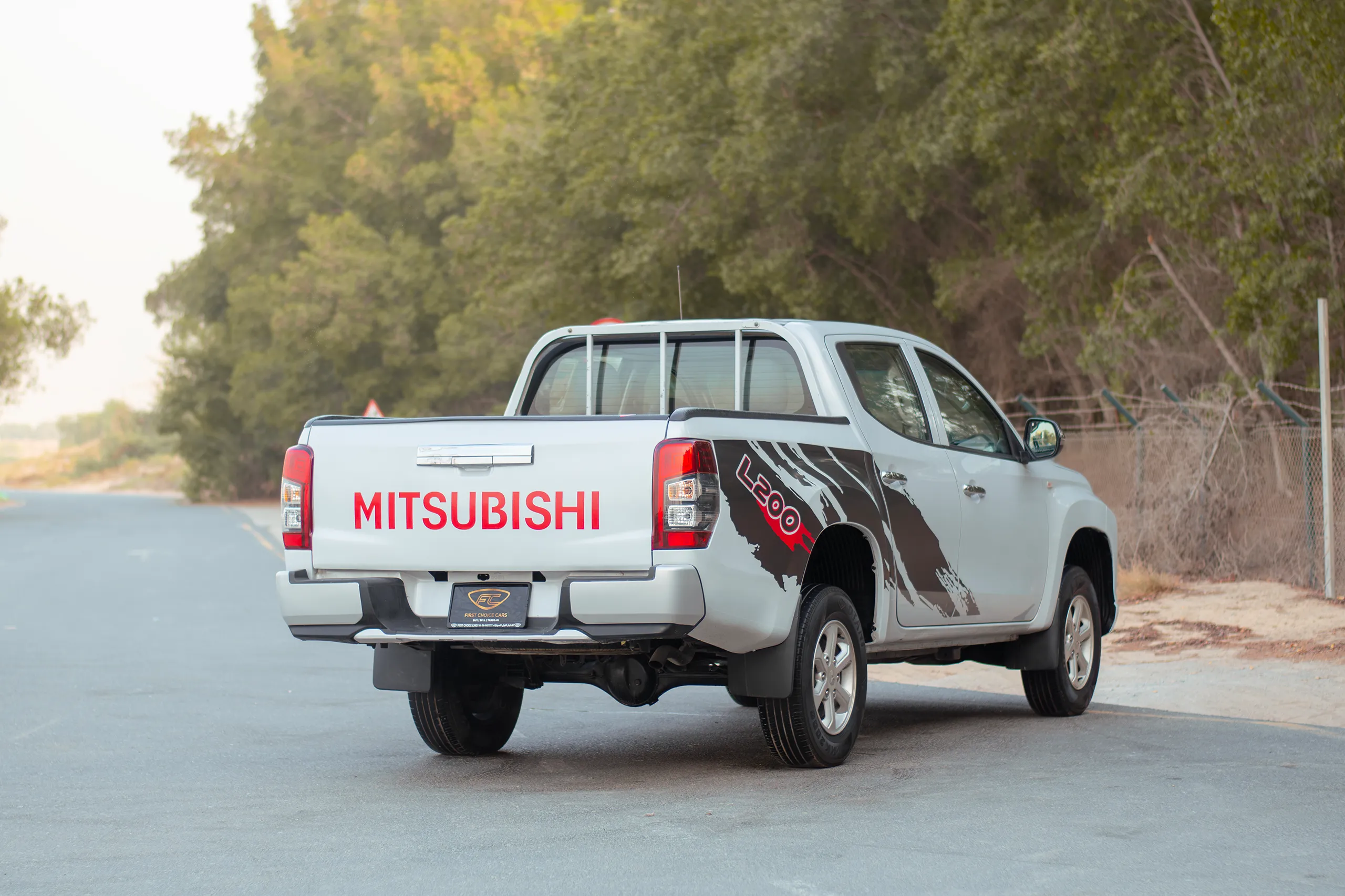 Used 2020 Mitsubishi L200 Double Cab GLX White – Right Back Diagonal (45°) View at First Choice Cars Sharjah