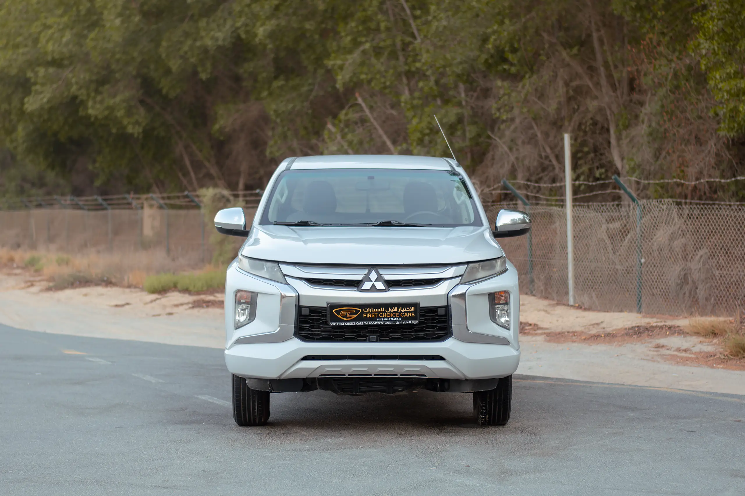 Used 2020 Mitsubishi L200 Double Cab GLX White – Front View at First Choice Cars Sharjah
