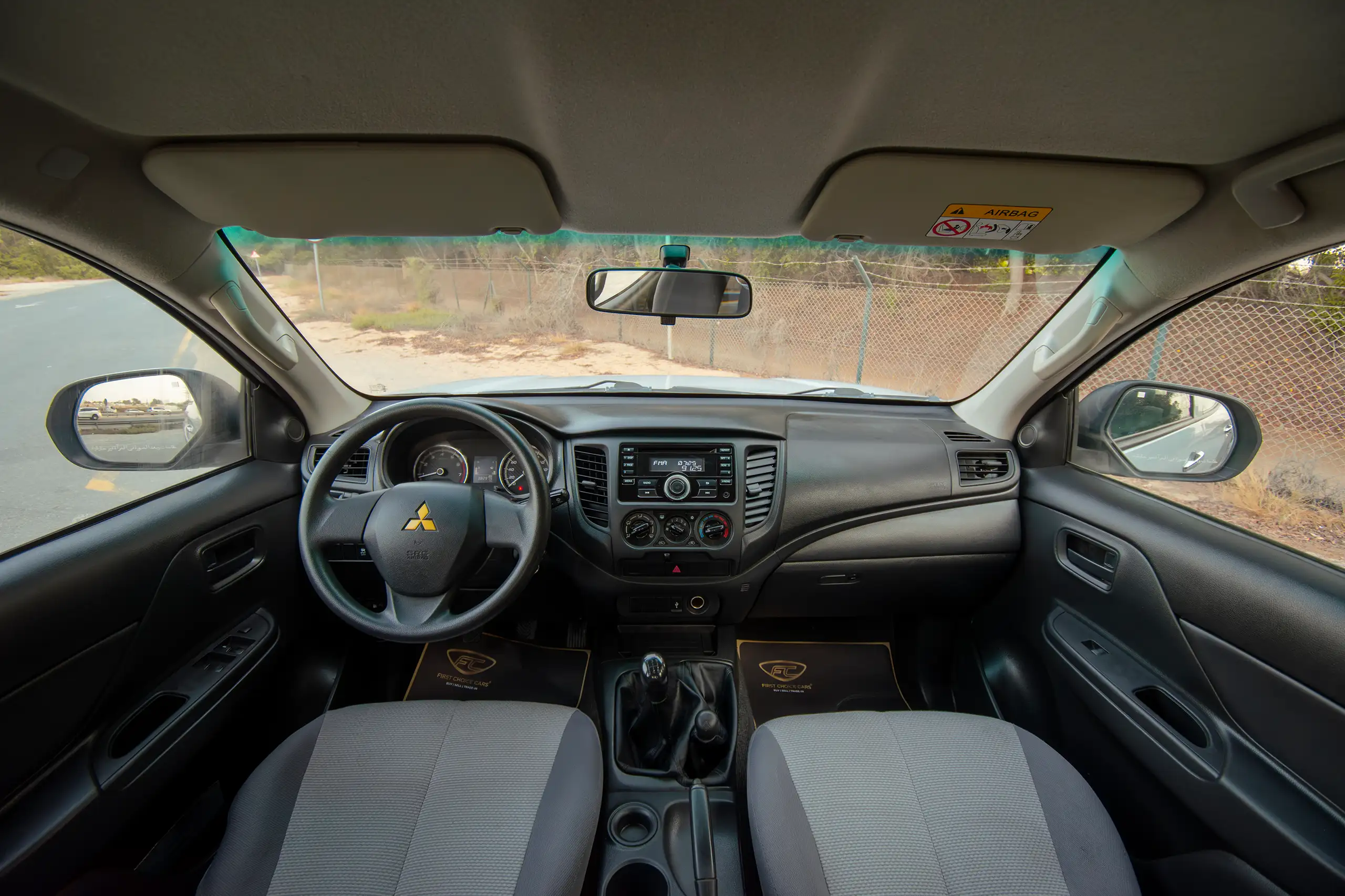 Used 2020 Mitsubishi L200 Double Cab GLX White – Front Cabin / Dashboard Full View at First Choice Cars Sharjah