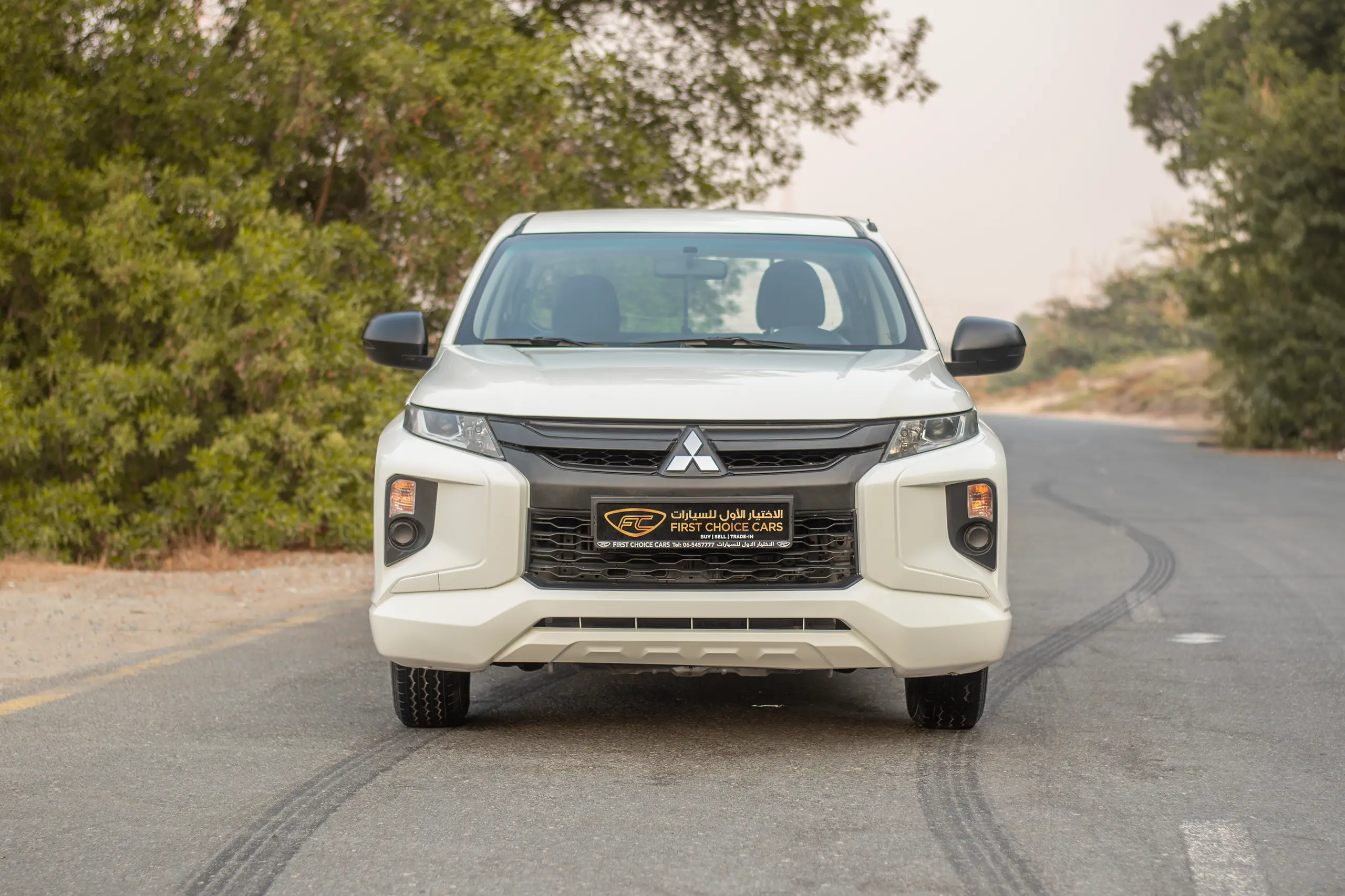Used 2020 Mitsubishi L200 Double Cab GLX White – Front View at First Choice Cars Sharjah