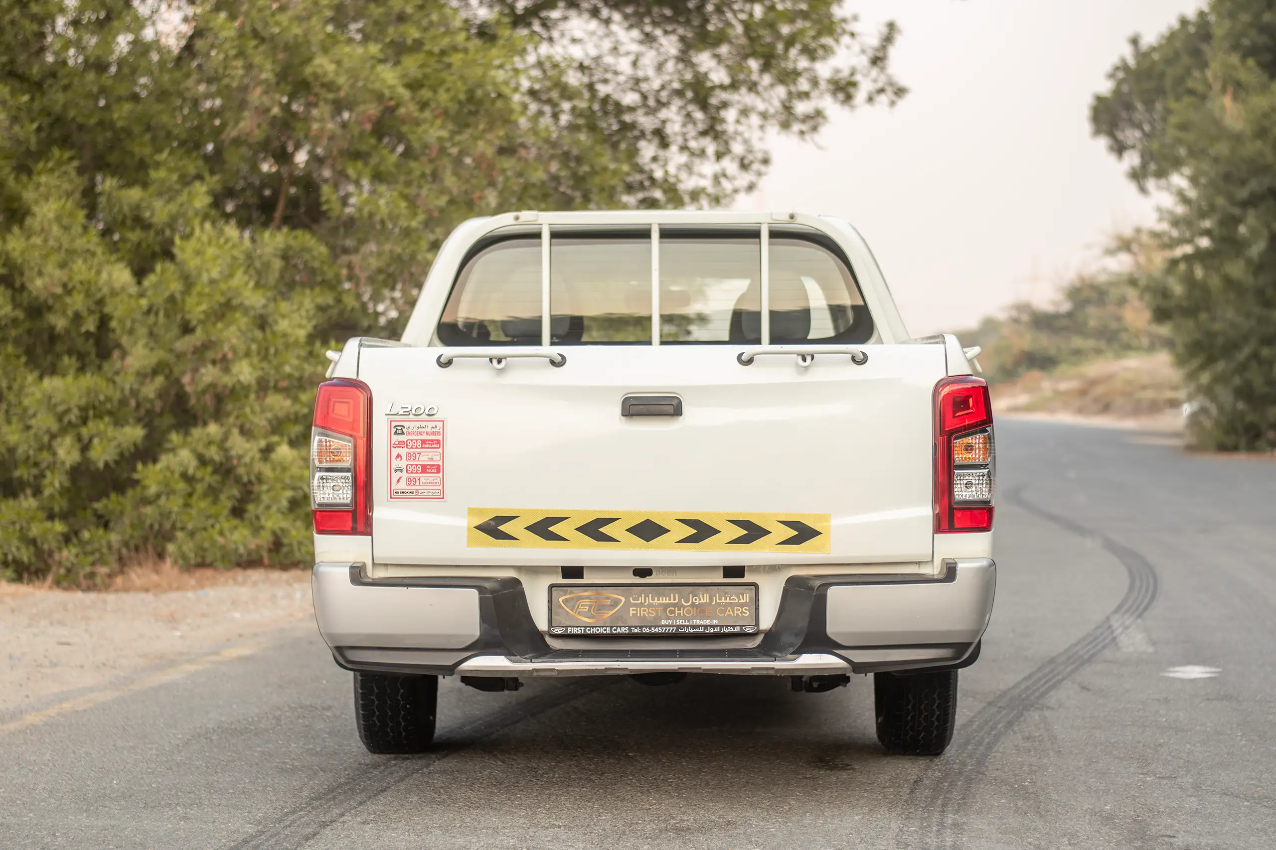 Used 2020 Mitsubishi L200 Double Cab GLX White – Back/Rear View at First Choice Cars Sharjah