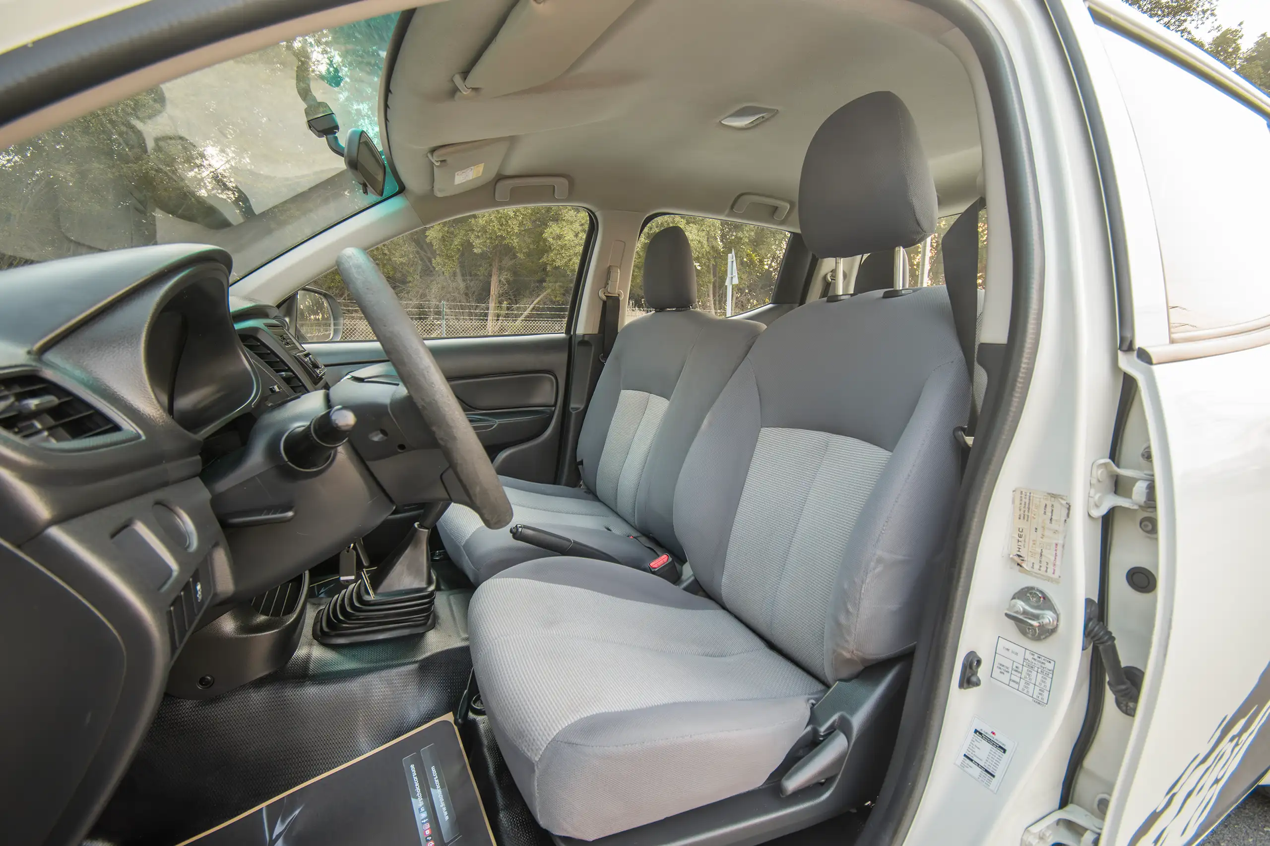 Used 2020 Mitsubishi L200 Double Cab GLX White – Front Driver Side Cabin View at First Choice Cars Sharjah