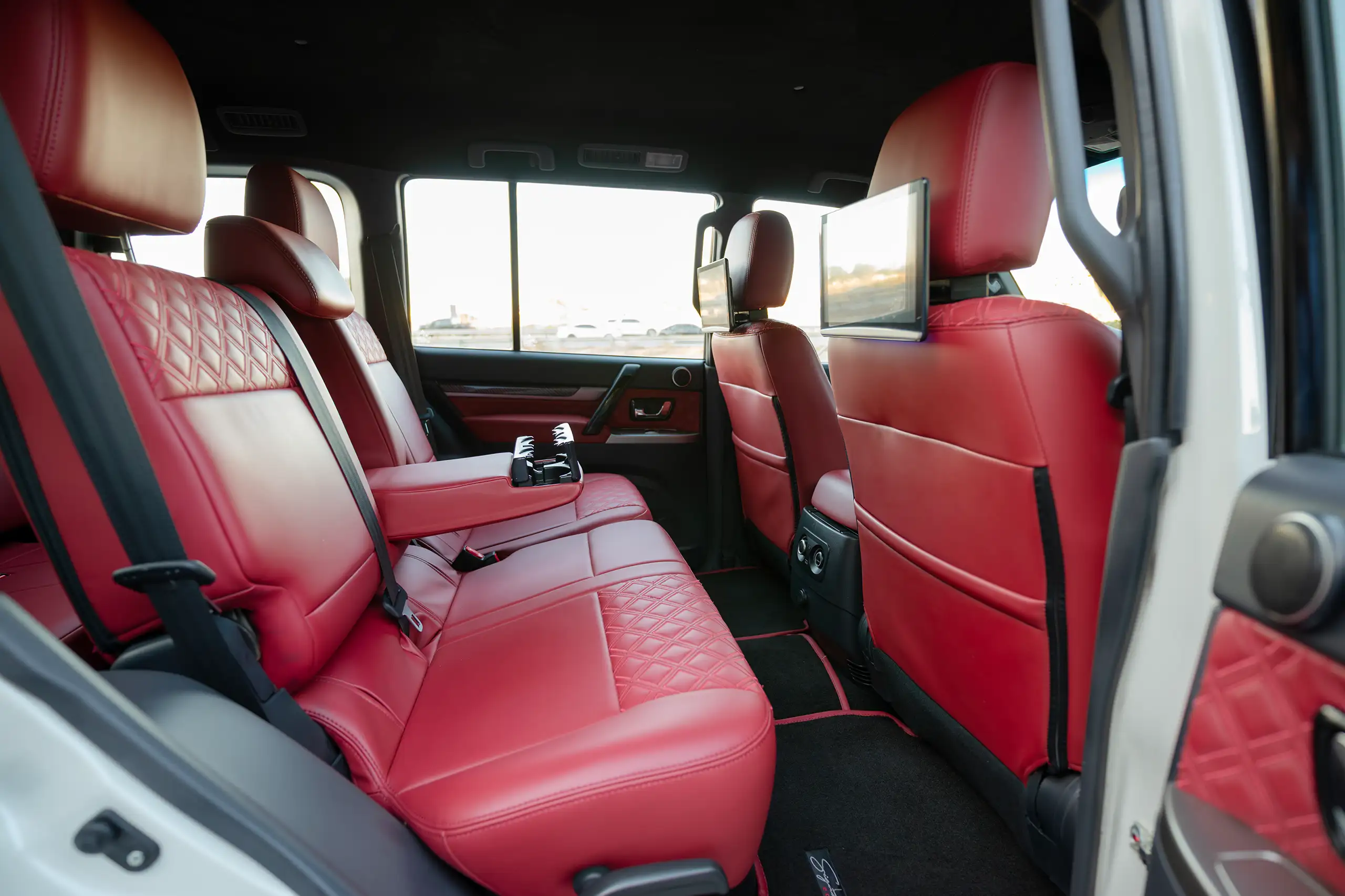 Used 2020 Mitsubishi Pajero Signature Edition White – Rear Passenger Side Cabin View at First Choice Cars Sharjah