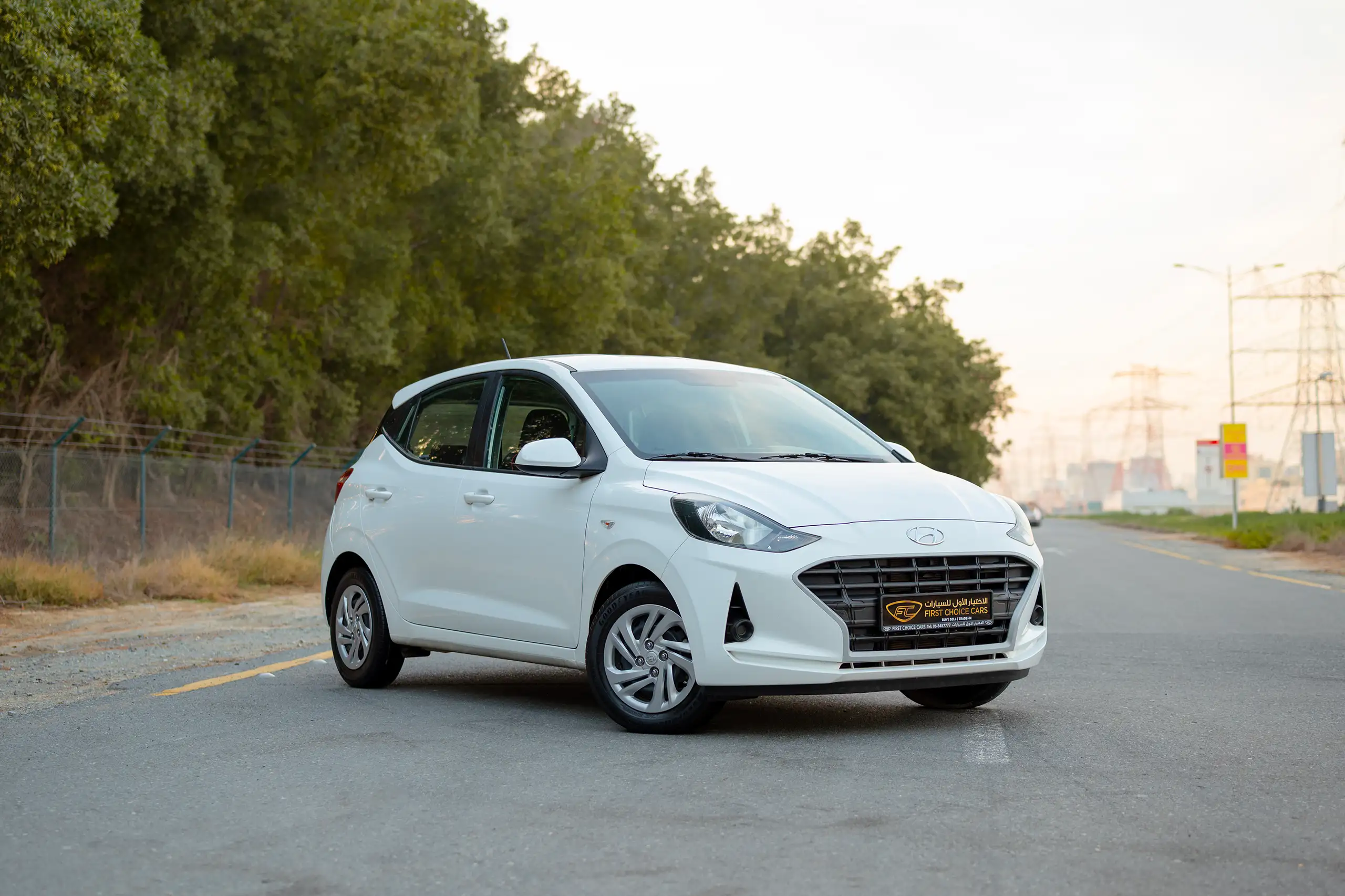 Used 2023 Hyundai Grand i10 Smart White – Right Front Diagonal (45°) View at First Choice Cars Sharjah