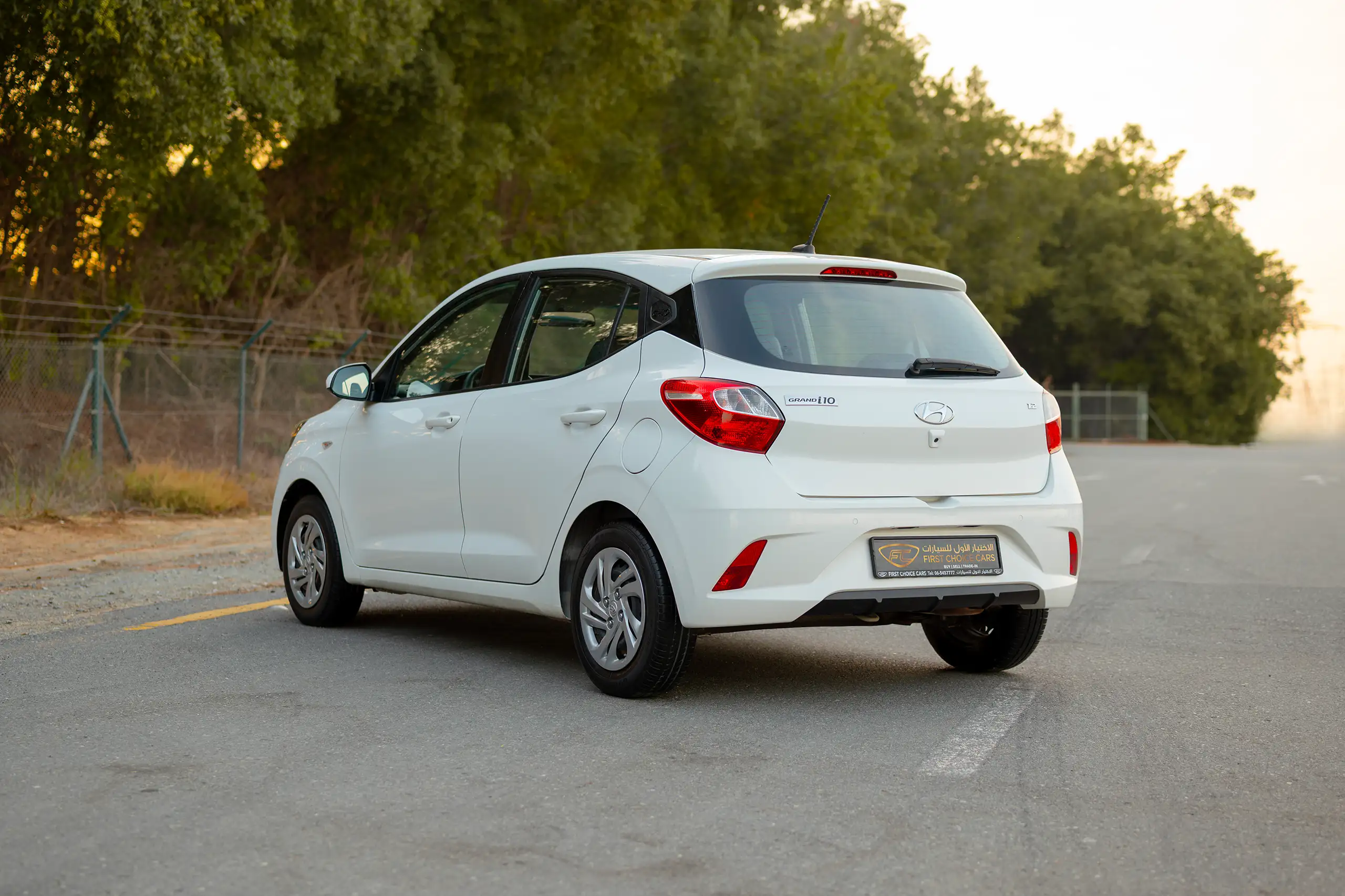 Used 2023 Hyundai Grand i10 Smart White – Left Back Diagonal (45°) View at First Choice Cars Sharjah