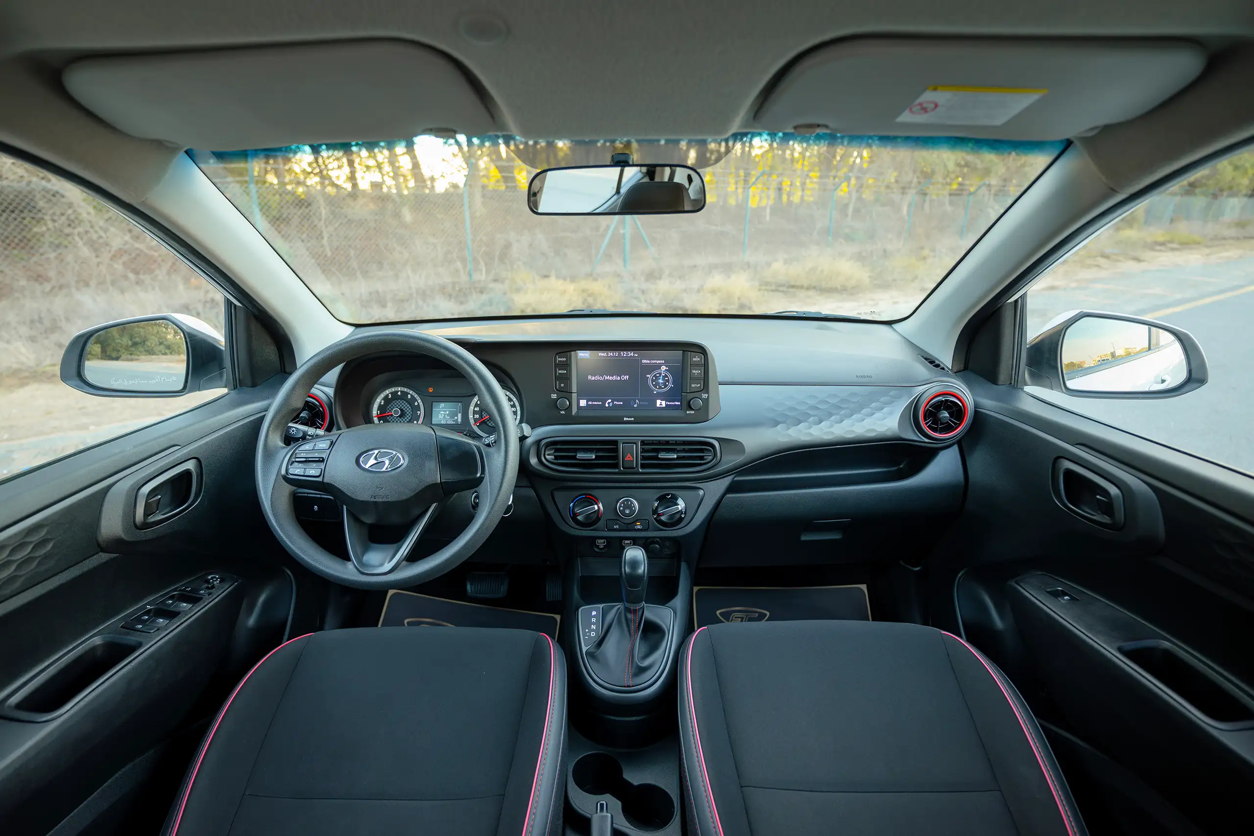 Used 2023 Hyundai Grand i10 Smart White – Front Cabin / Dashboard Full View at First Choice Cars Sharjah