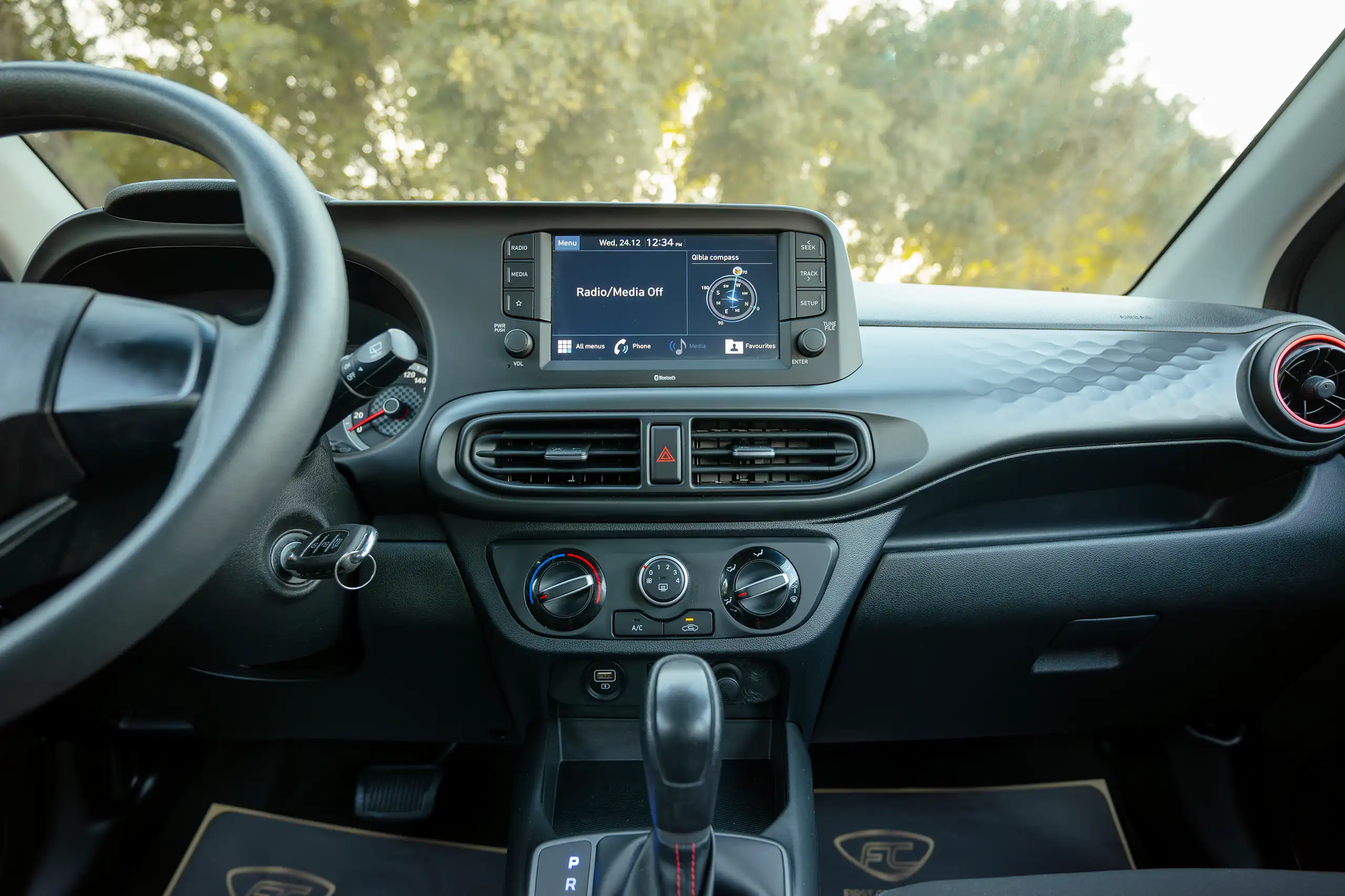 Used 2023 Hyundai Grand i10 Smart White – Infotainment / Touchscreen System at First Choice Cars Sharjah