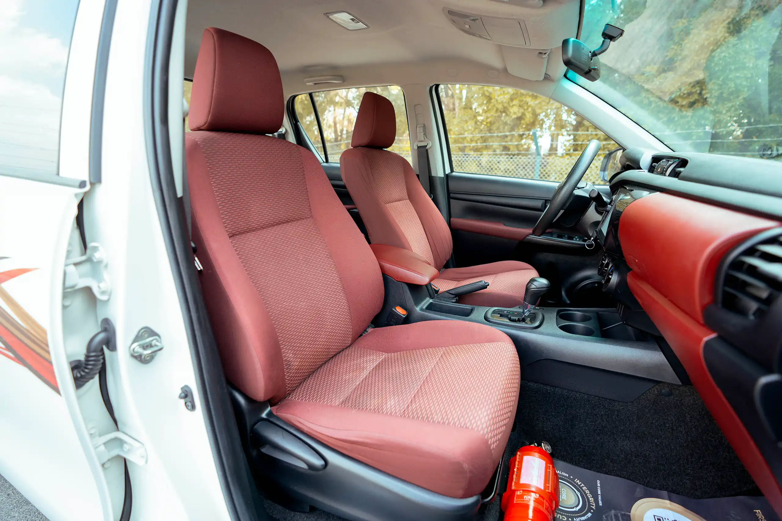 Used 2022 Toyota Hilux GLX Double Cabin White – Front Passenger Side Cabin View at First Choice Cars Sharjah