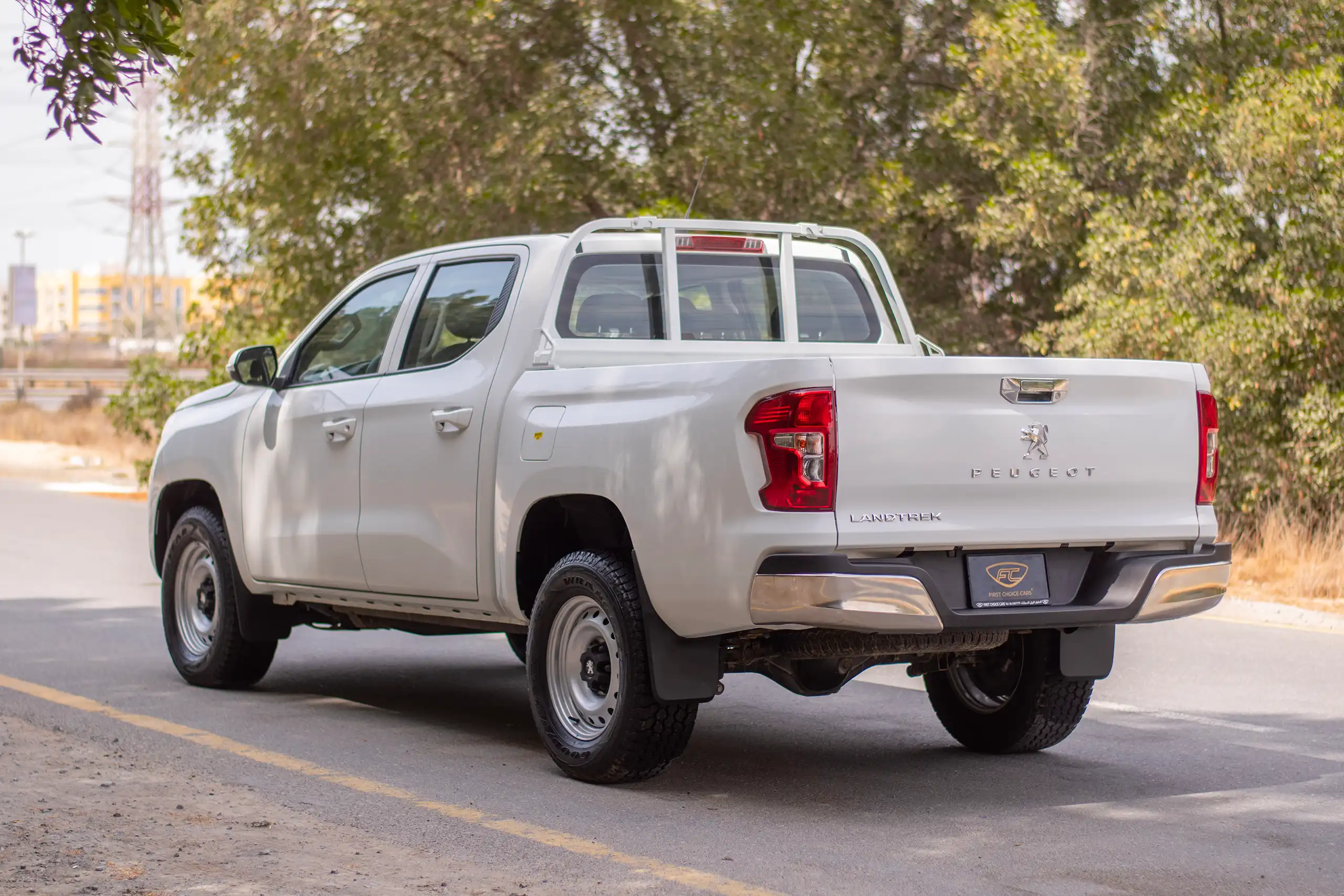 Used 2023 Peugeot Landtrek Double Cabin White – Left Back Diagonal (45°) View at First Choice Cars Sharjah
