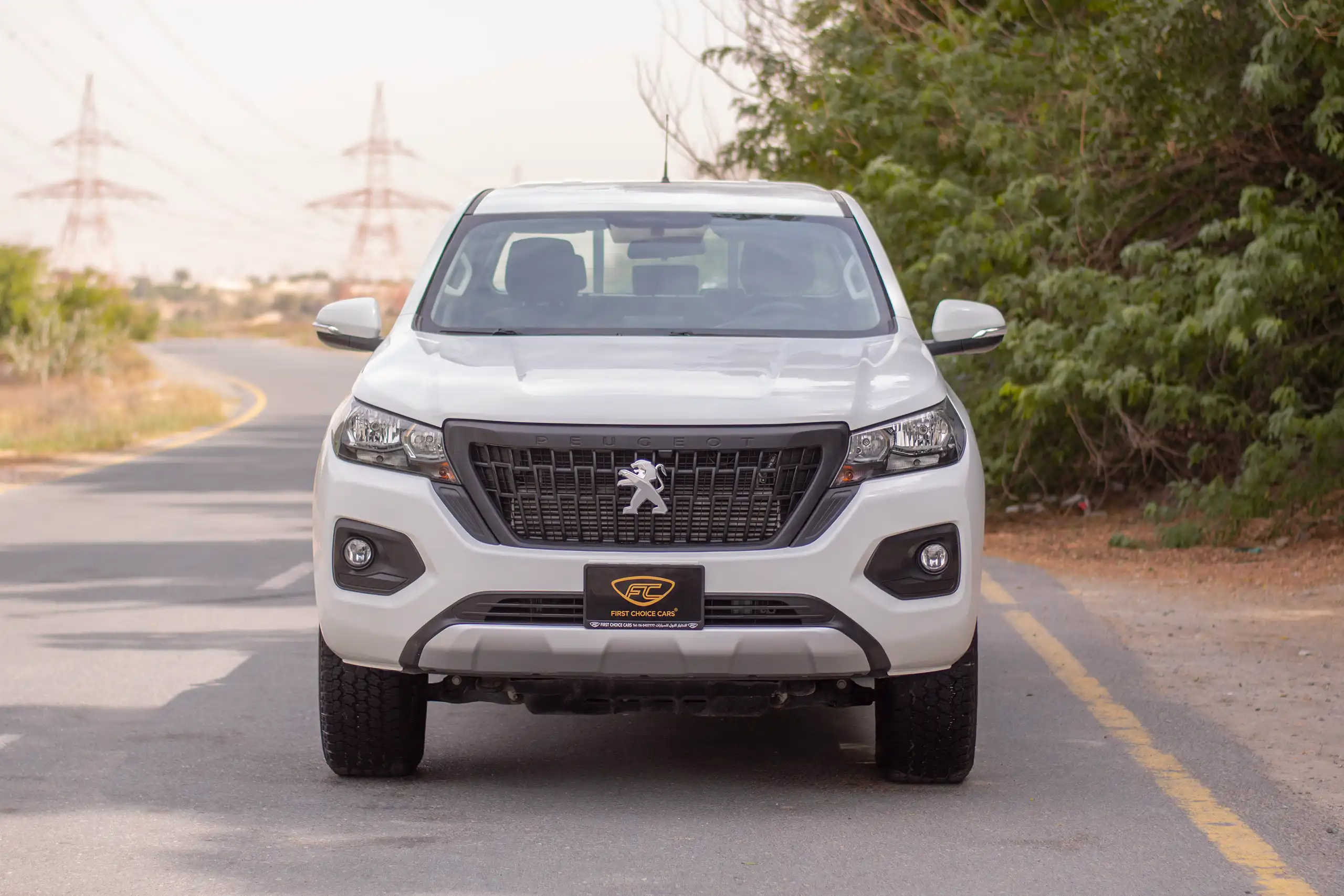 Used 2023 Peugeot Landtrek Double Cabin White – Front View at First Choice Cars Sharjah