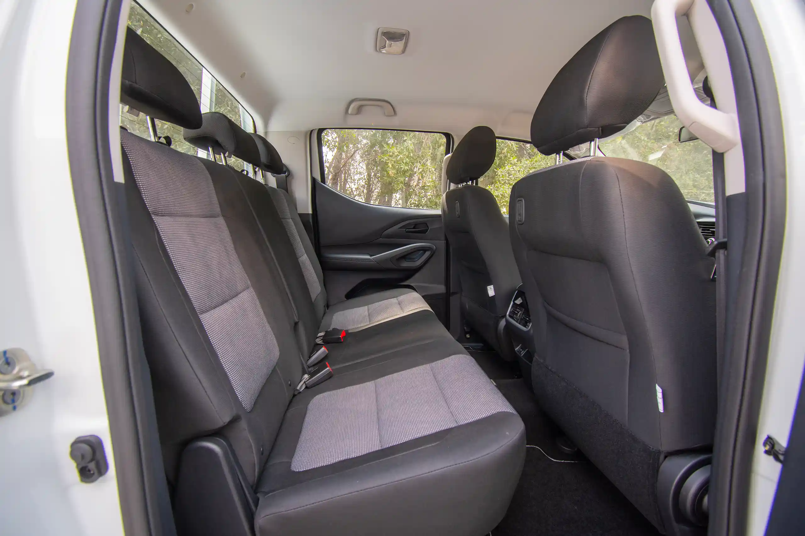 Used 2023 Peugeot Landtrek Double Cabin White – Rear Passenger Side Cabin View at First Choice Cars Sharjah