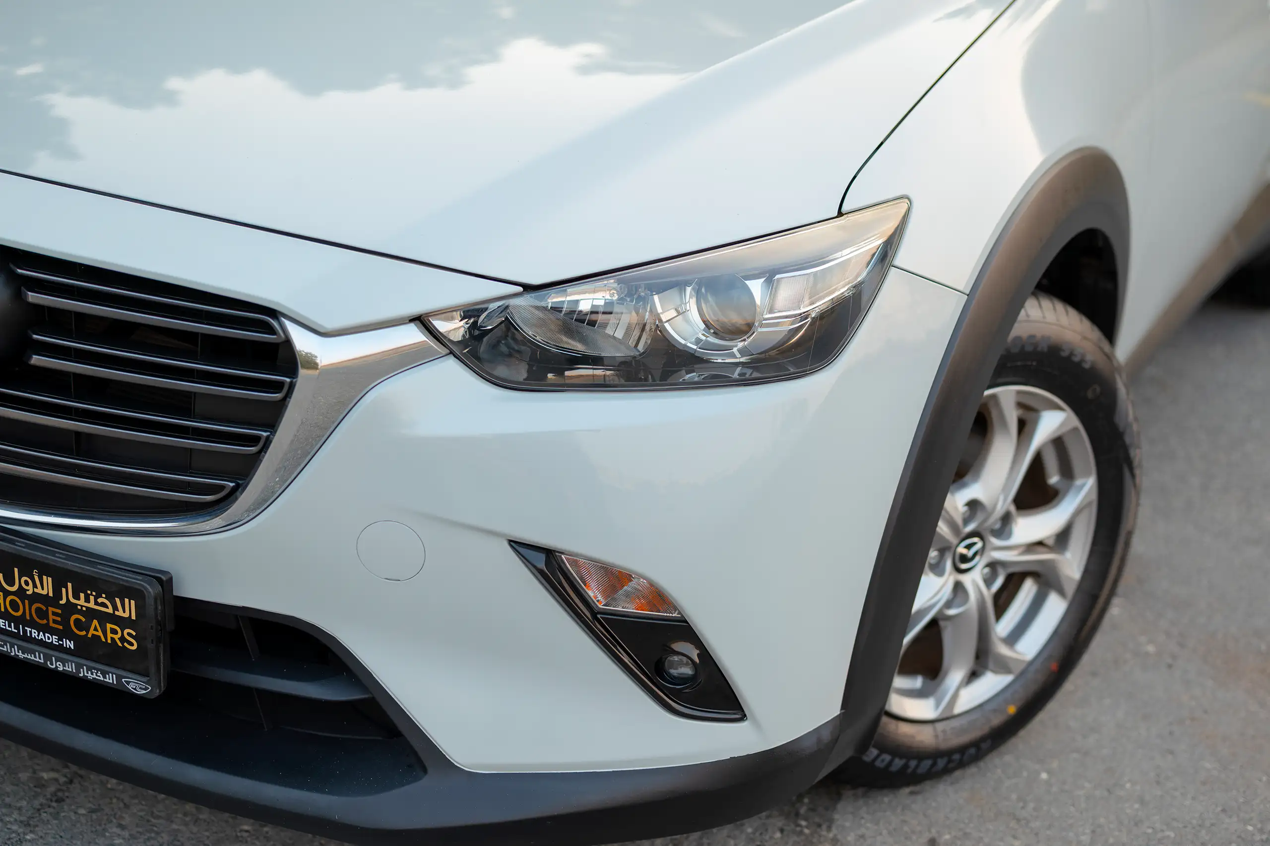 Used 2021 Mazda CX-3 GS Silver – Headlight Close-up at First Choice Cars Sharjah