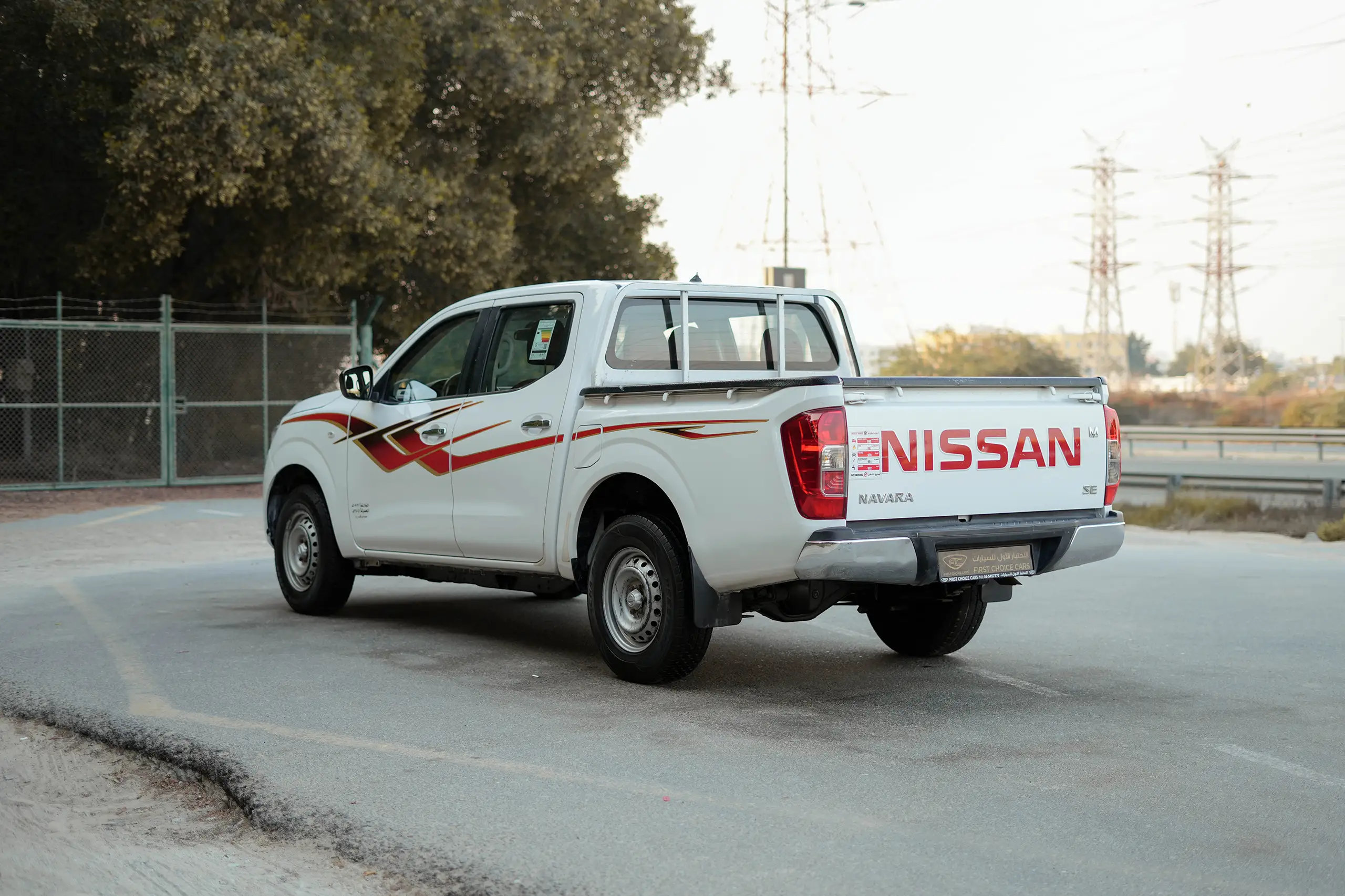 Used 2020 Nissan Navara SE White – Left Back Diagonal (45°) View at First Choice Cars Sharjah