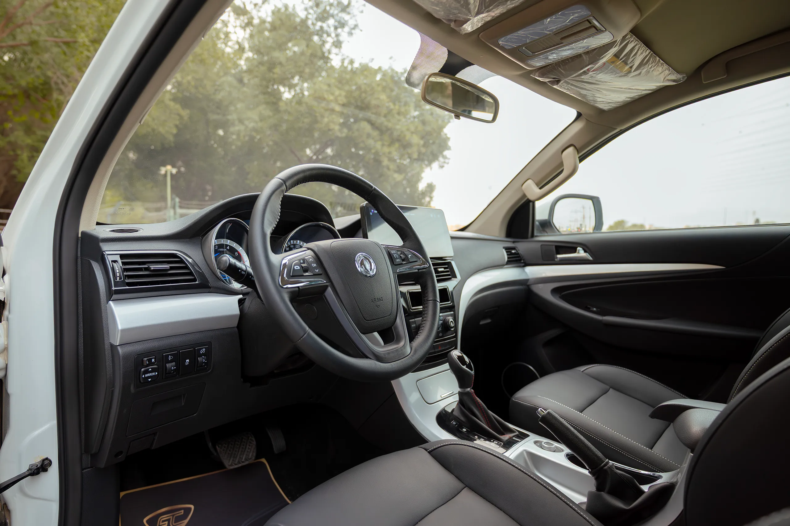 Used 2025 DongFeng RICH 6 Double Cabin White – Driver Side Dashboard & Steering View at First Choice Cars Sharjah