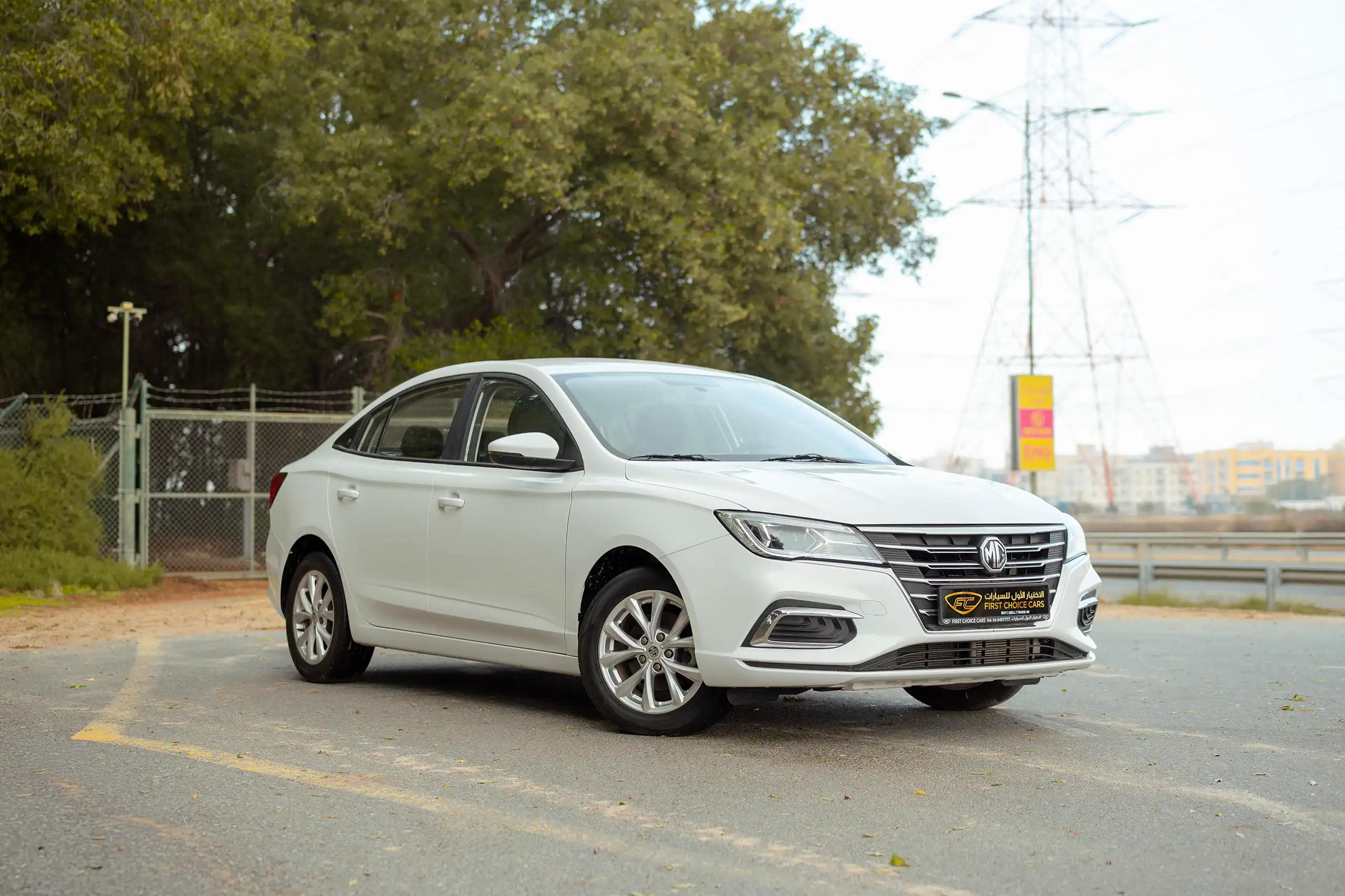 Used 2024 MG 5 Comfort White – Right Front Diagonal (45°) View at First Choice Cars Sharjah