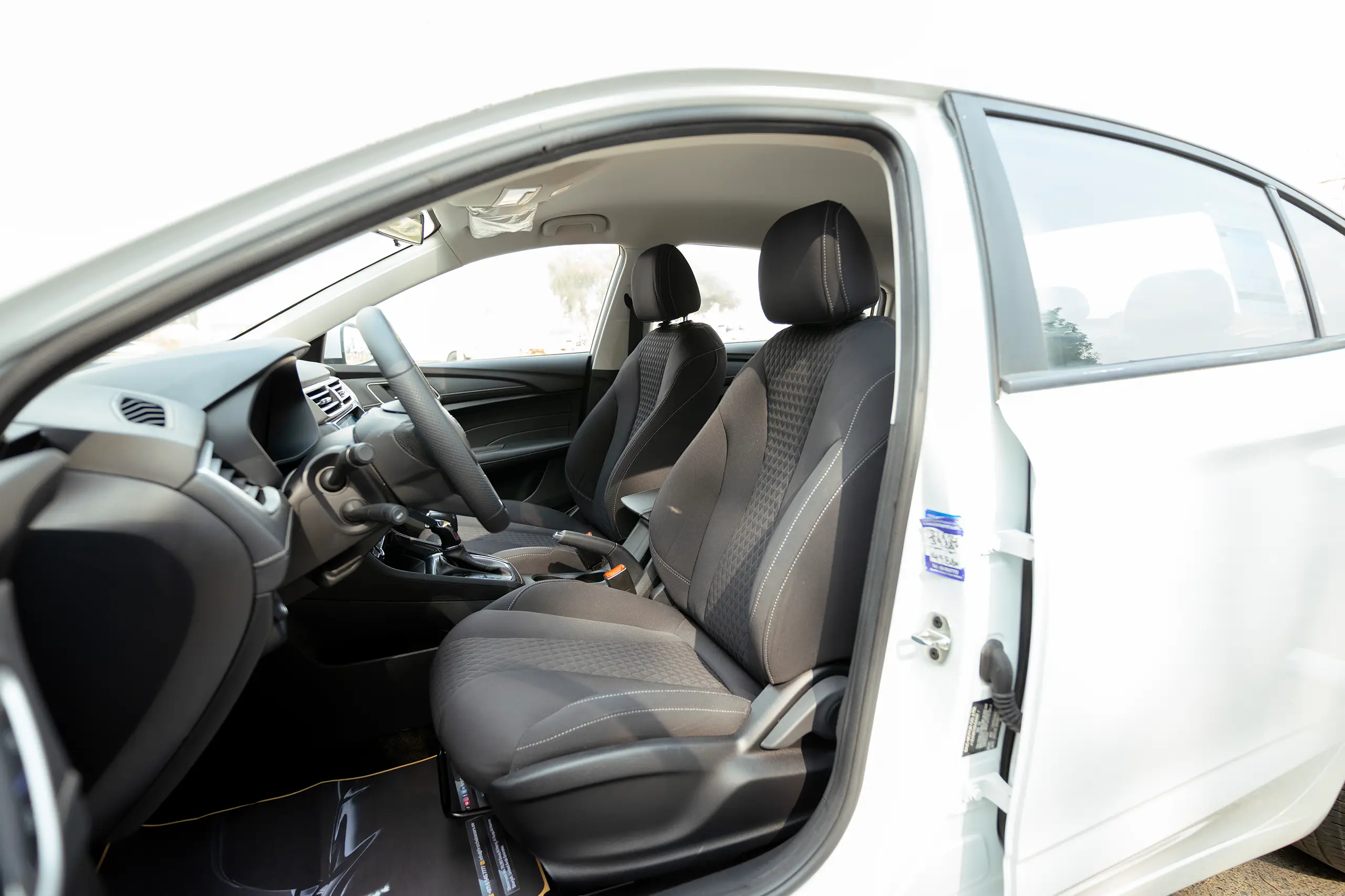 Used 2024 MG 5 Comfort White – Front Driver Side Cabin View at First Choice Cars Sharjah