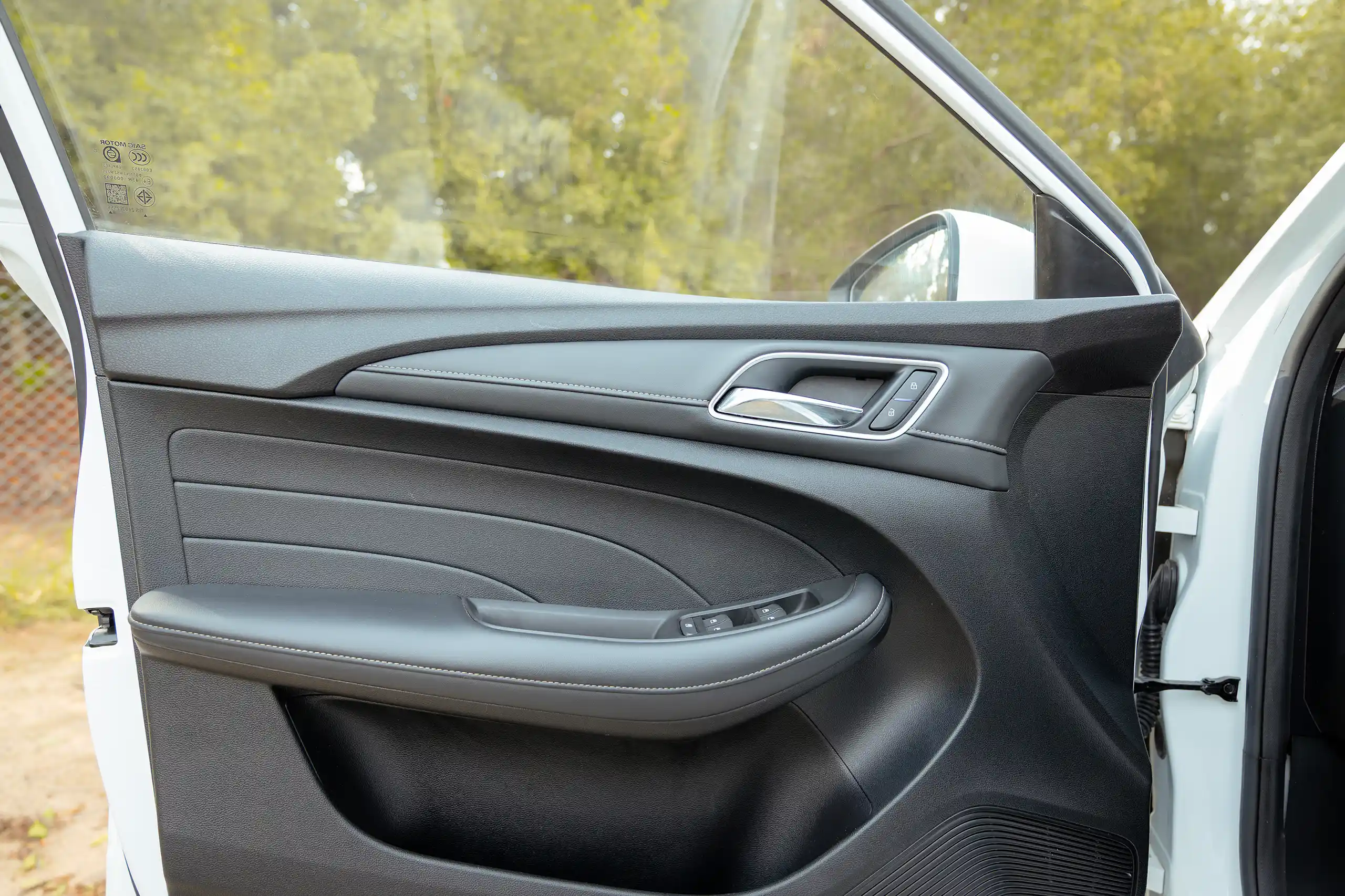 Used 2024 MG 5 Comfort White – Driver Door Panel Full View at First Choice Cars Sharjah