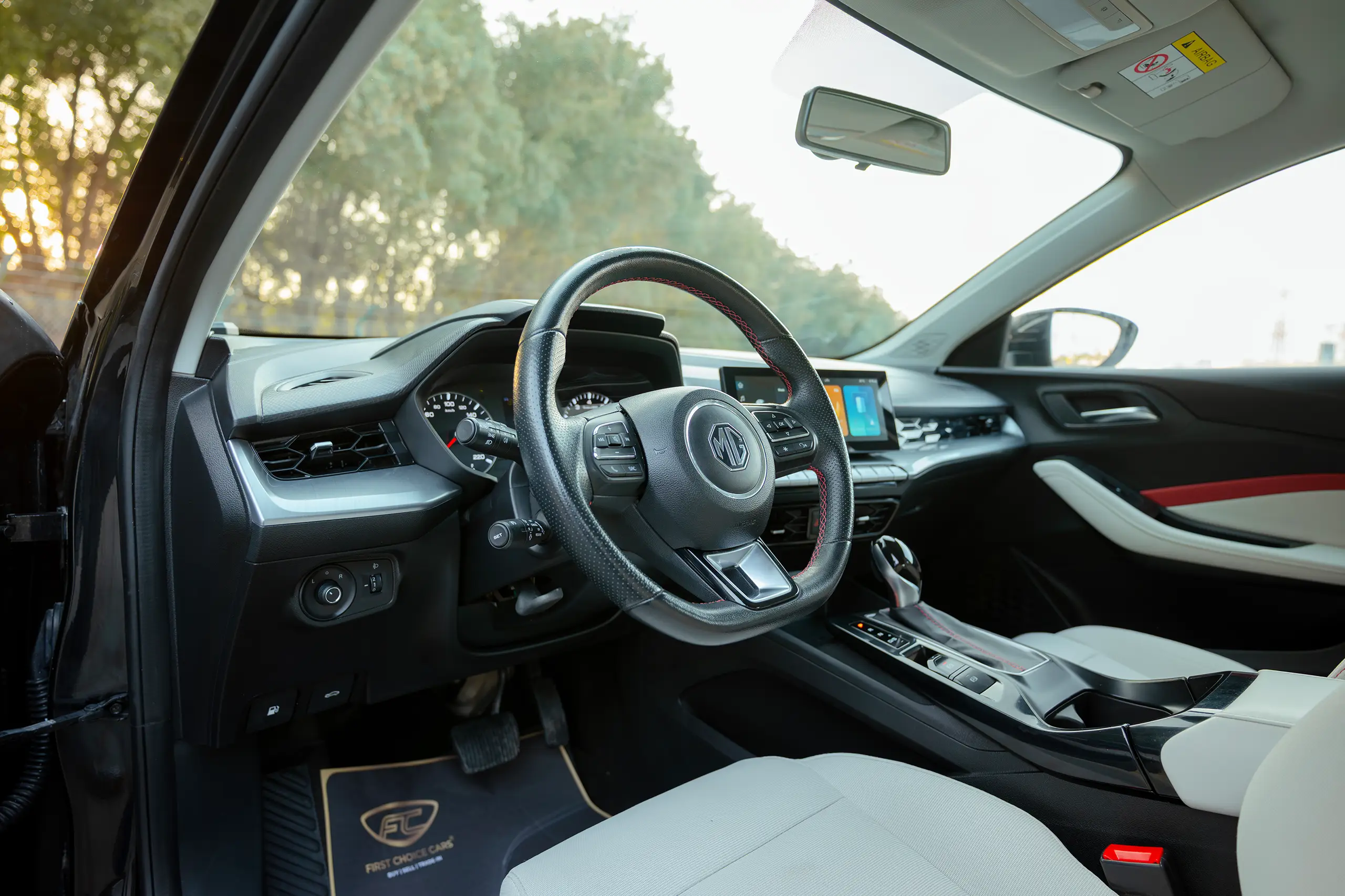 Used 2022 MG GT Comfort Black – Driver Side Dashboard & Steering View at First Choice Cars Sharjah