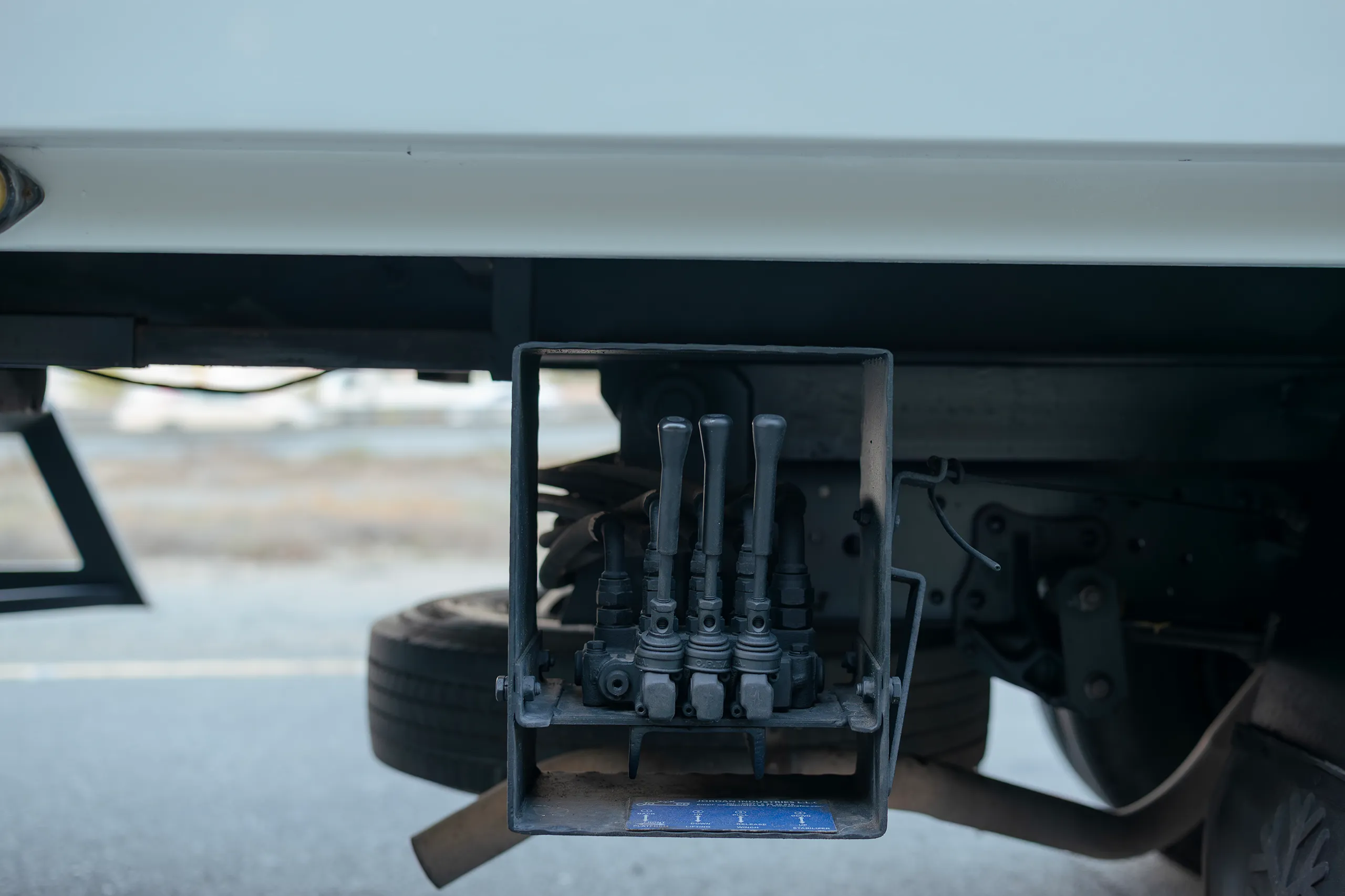 Used 2017 Isuzu NPR Recovery White – Recovery Rear Hydraulic Control Detail View at First Choice Cars Sharjah