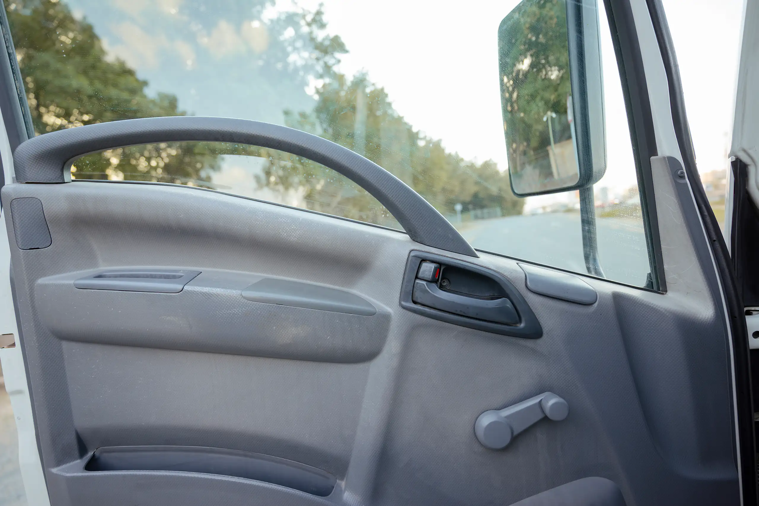 Used 2017 Isuzu NPR Recovery White – Driver Door Panel Full View at First Choice Cars Sharjah