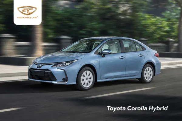 Toyota Corolla Hybrid, a compact hybrid sedan in light blue