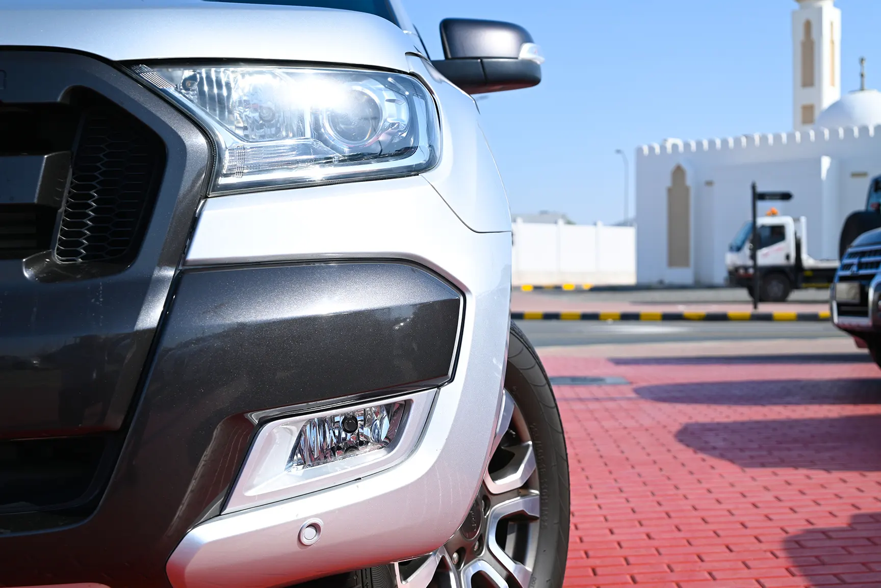 Used 2018 Ford Ranger Wildtrak Silver – Headlight Close-up at First Choice Cars Sharjah