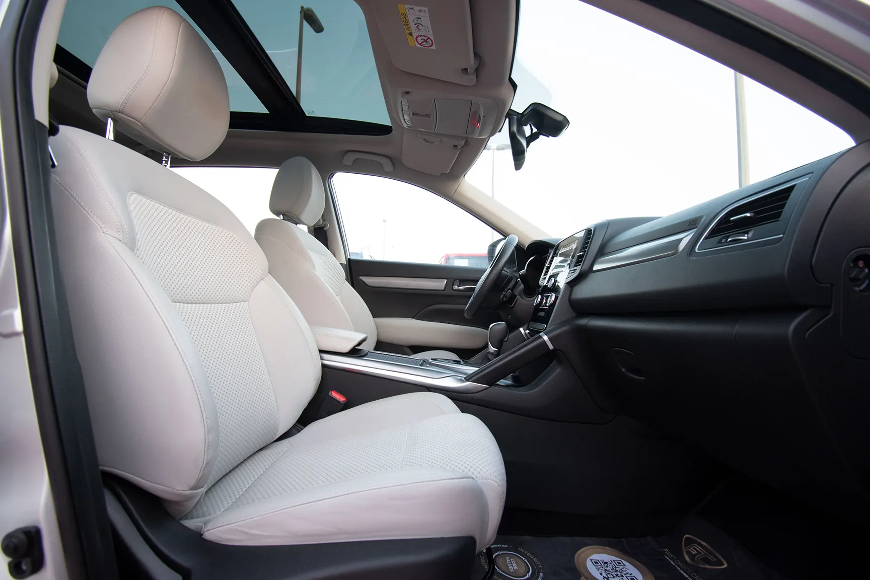 Used 2018 Renault Koleos Pe Silver – Front Passenger Side Cabin View at First Choice Cars Sharjah