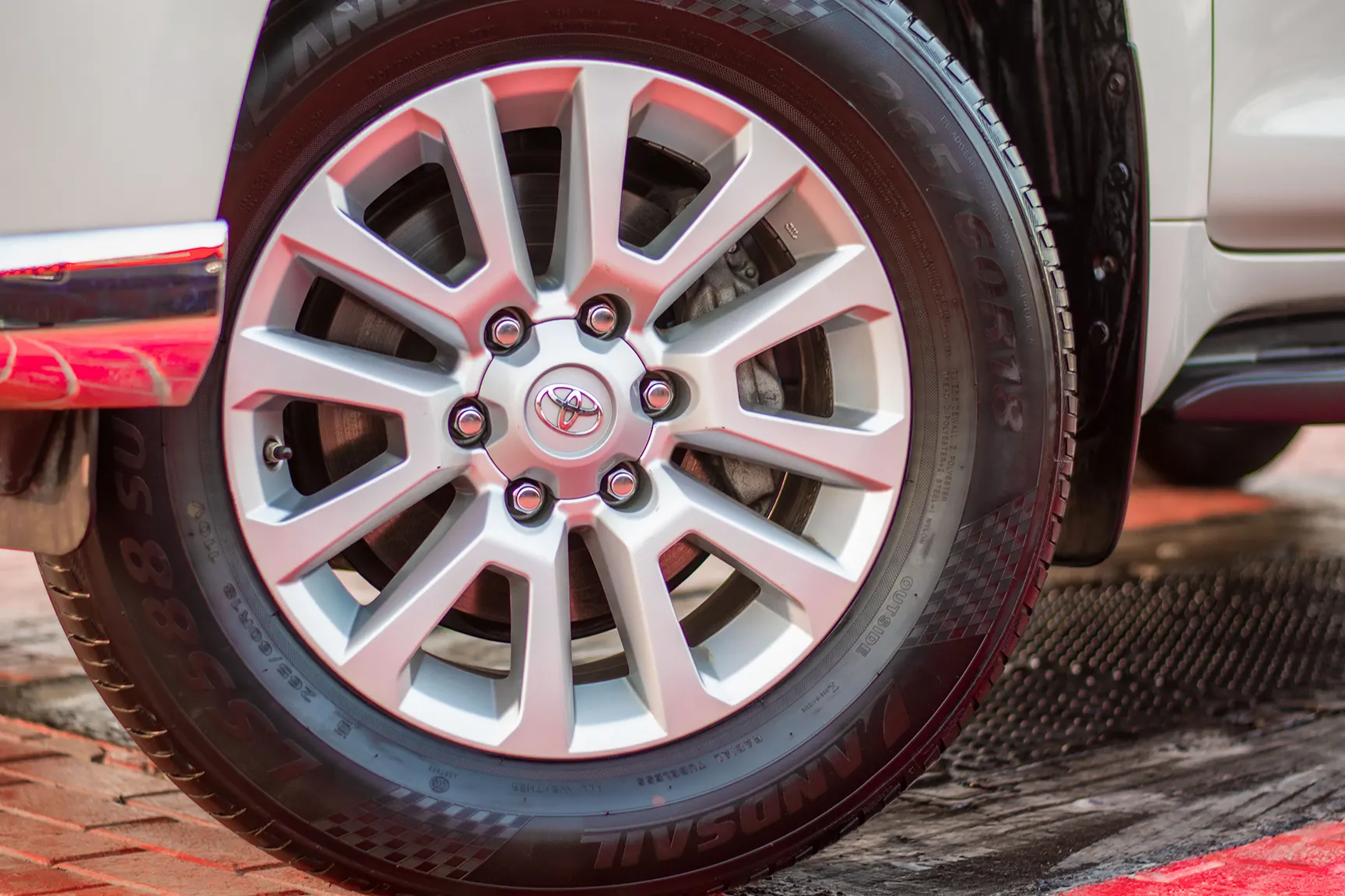 Used 2017 Toyota Prado VXR White – Close-up of Alloy Wheels / Tires at First Choice Cars Sharjah