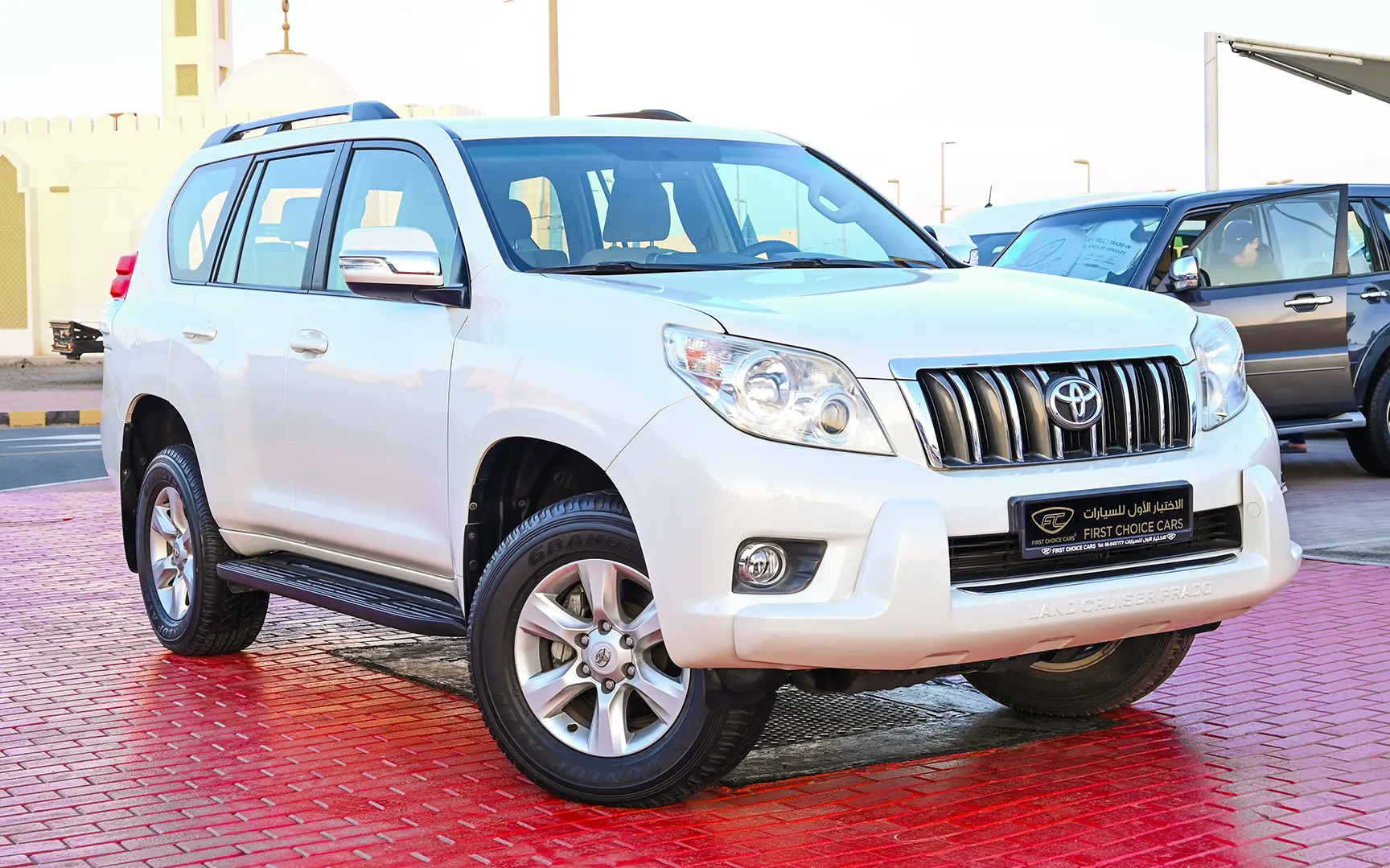 Used 2013 Toyota Prado Txl White – Right Front Diagonal (45°) View at First Choice Cars Sharjah