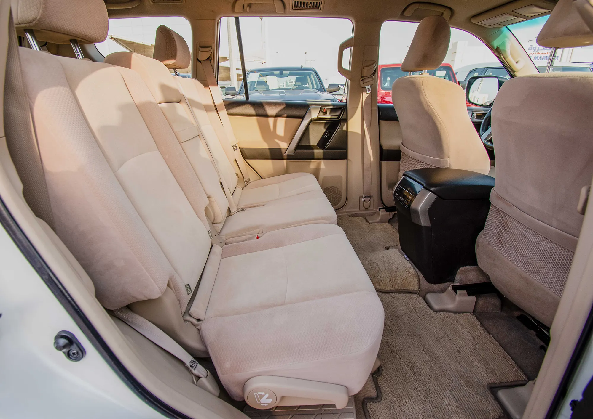 Used 2013 Toyota Prado Txl White – Rear Passenger Side Cabin View at First Choice Cars Sharjah