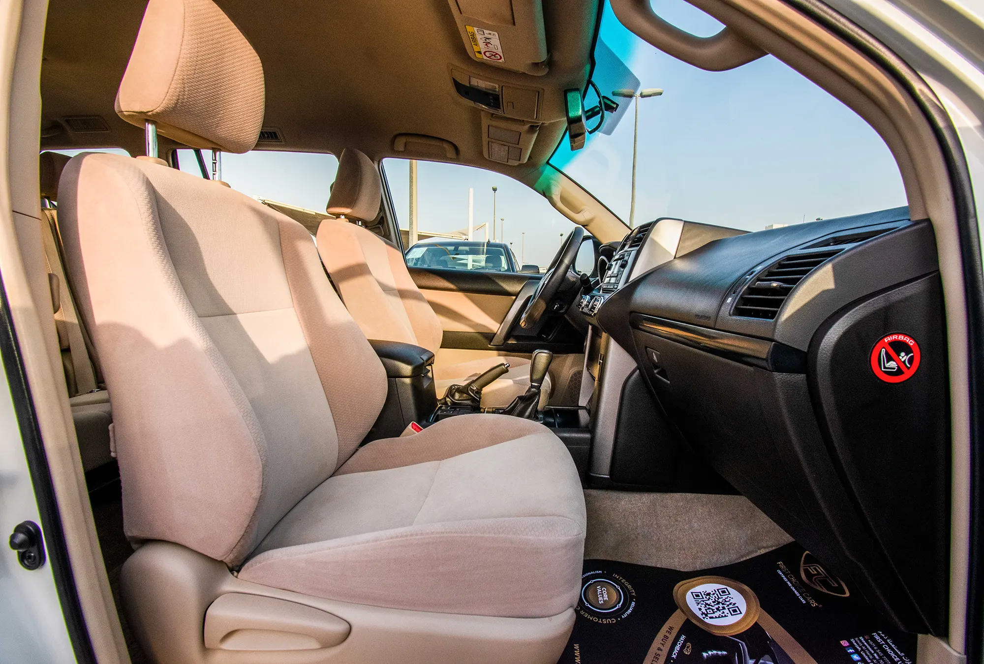 Used 2013 Toyota Prado Txl White – Front Passenger Side Cabin View at First Choice Cars Sharjah