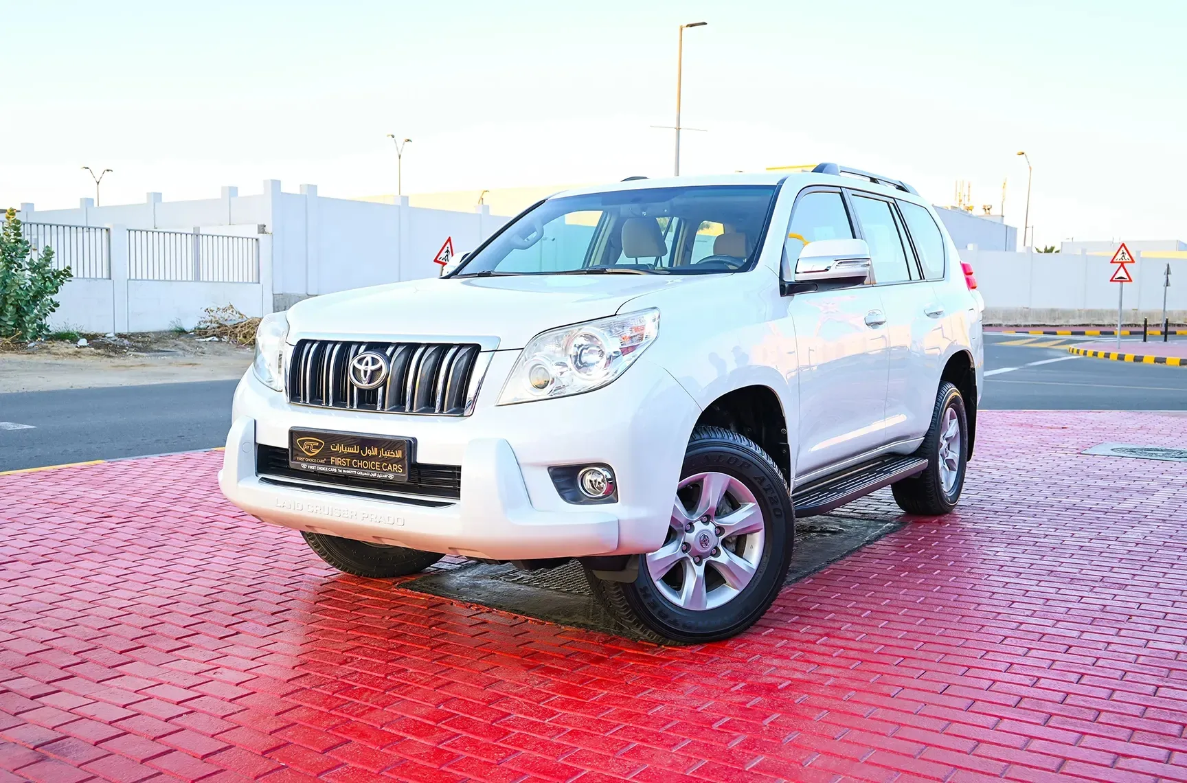 Used 2013 Toyota Prado Txl White – Left Front Diagonal (45°) View at First Choice Cars Sharjah