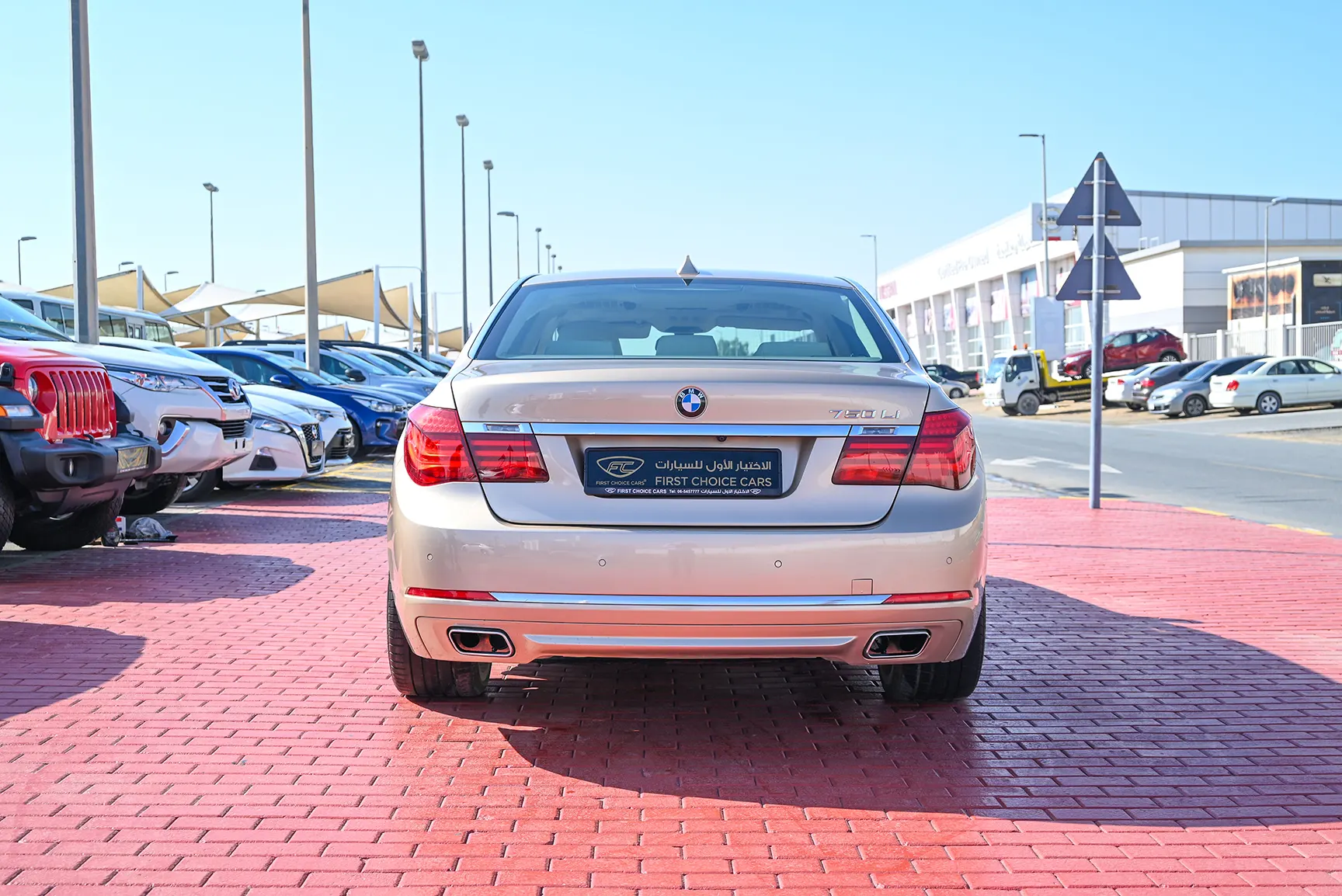 Used 2013 BMW 7-Series 750Li Gold – Back/Rear View at First Choice Cars Sharjah