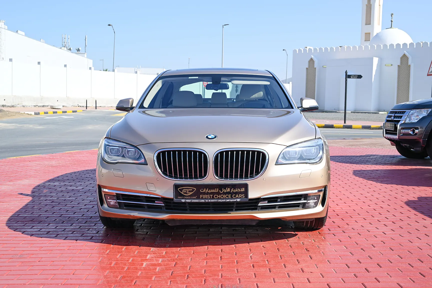 Used 2013 BMW 7-Series 750Li Gold – Front View at First Choice Cars Sharjah