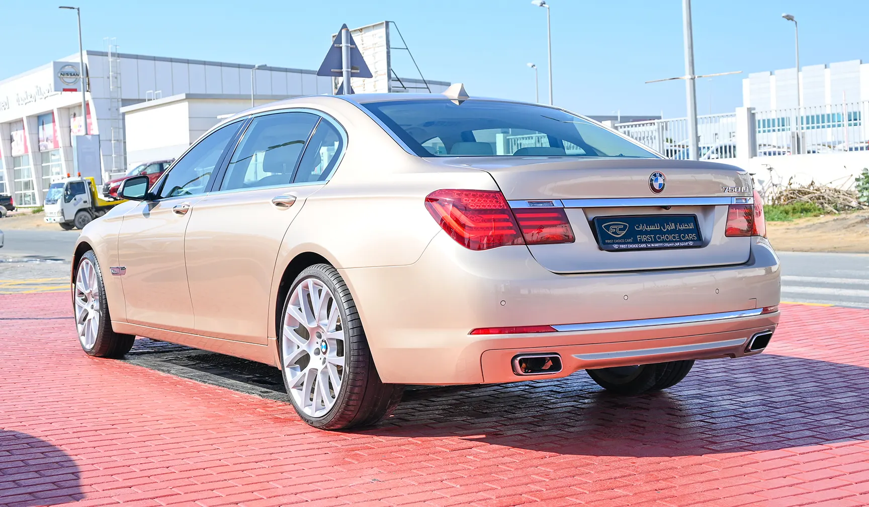 Used 2013 BMW 7-Series 750Li Gold – Left Back Diagonal (45°) View at First Choice Cars Sharjah