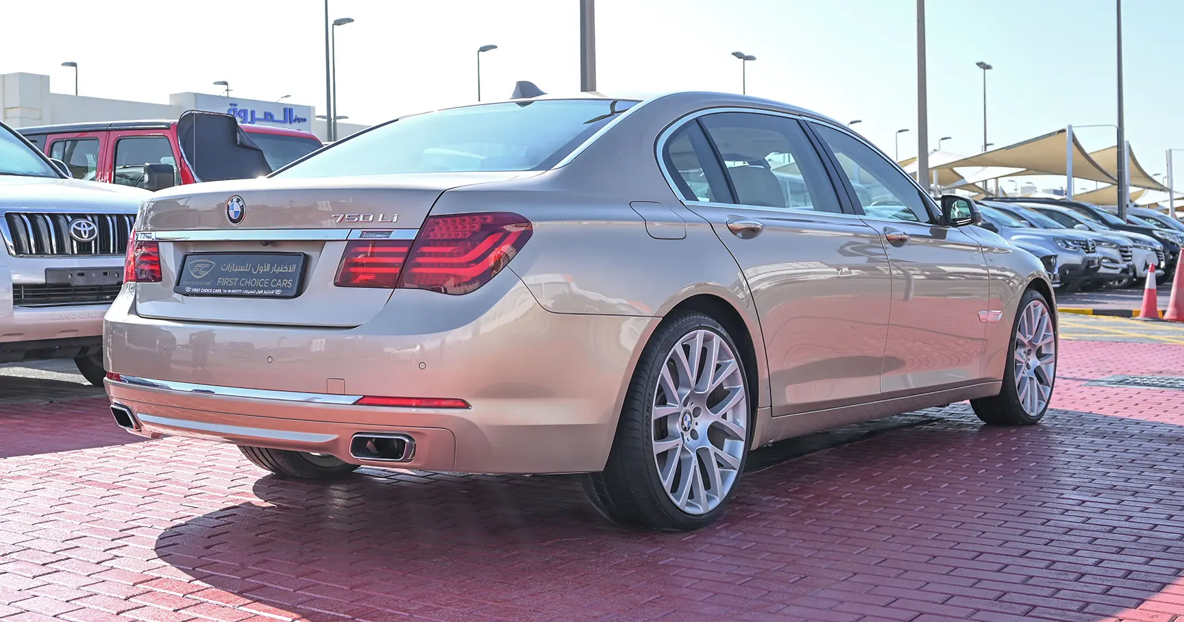 Used 2013 BMW 7-Series 750Li Gold – Right Back Diagonal (45°) View at First Choice Cars Sharjah