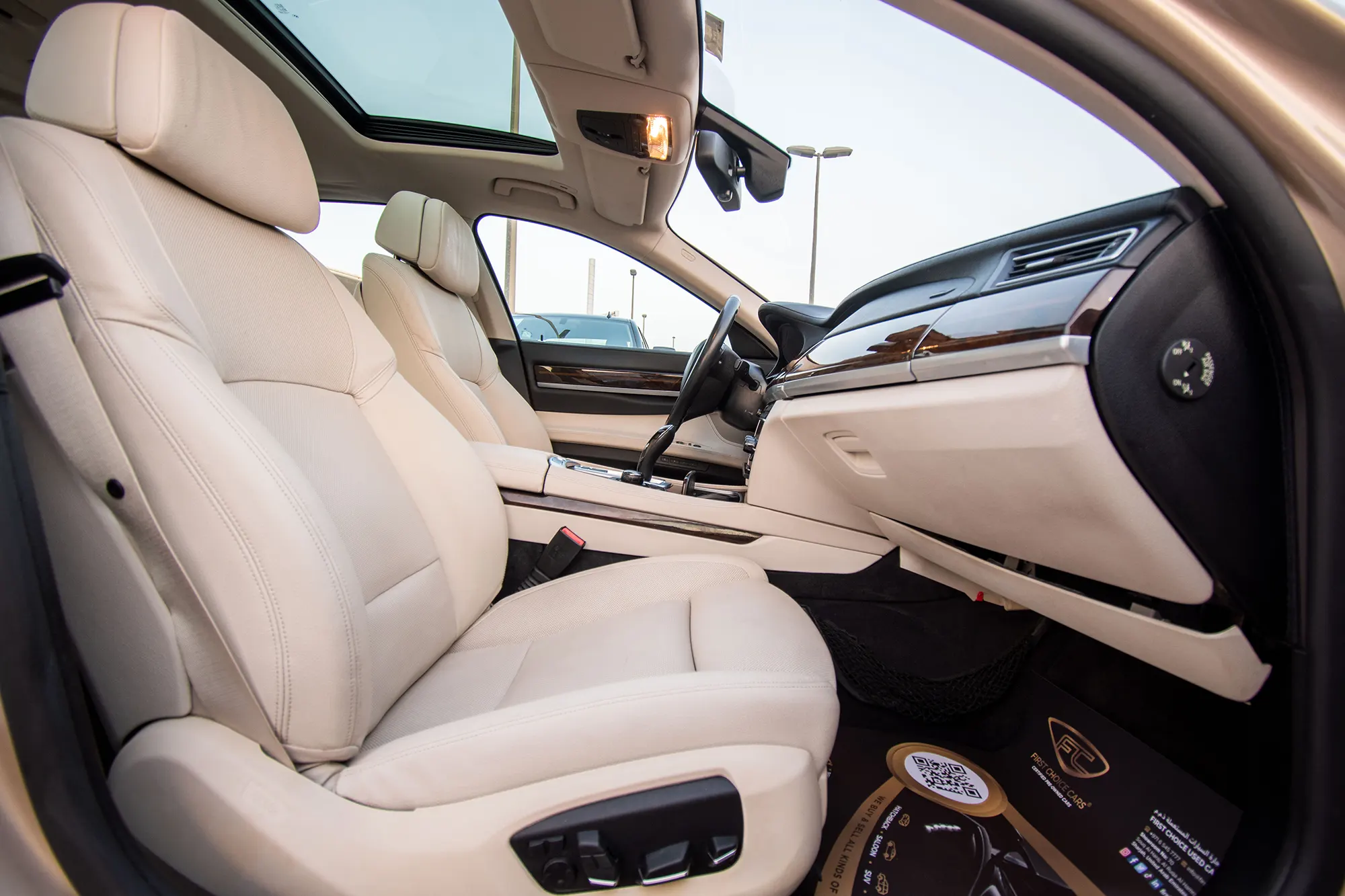 Used 2013 BMW 7-Series 750Li Gold – Front Passenger Side Cabin View at First Choice Cars Sharjah
