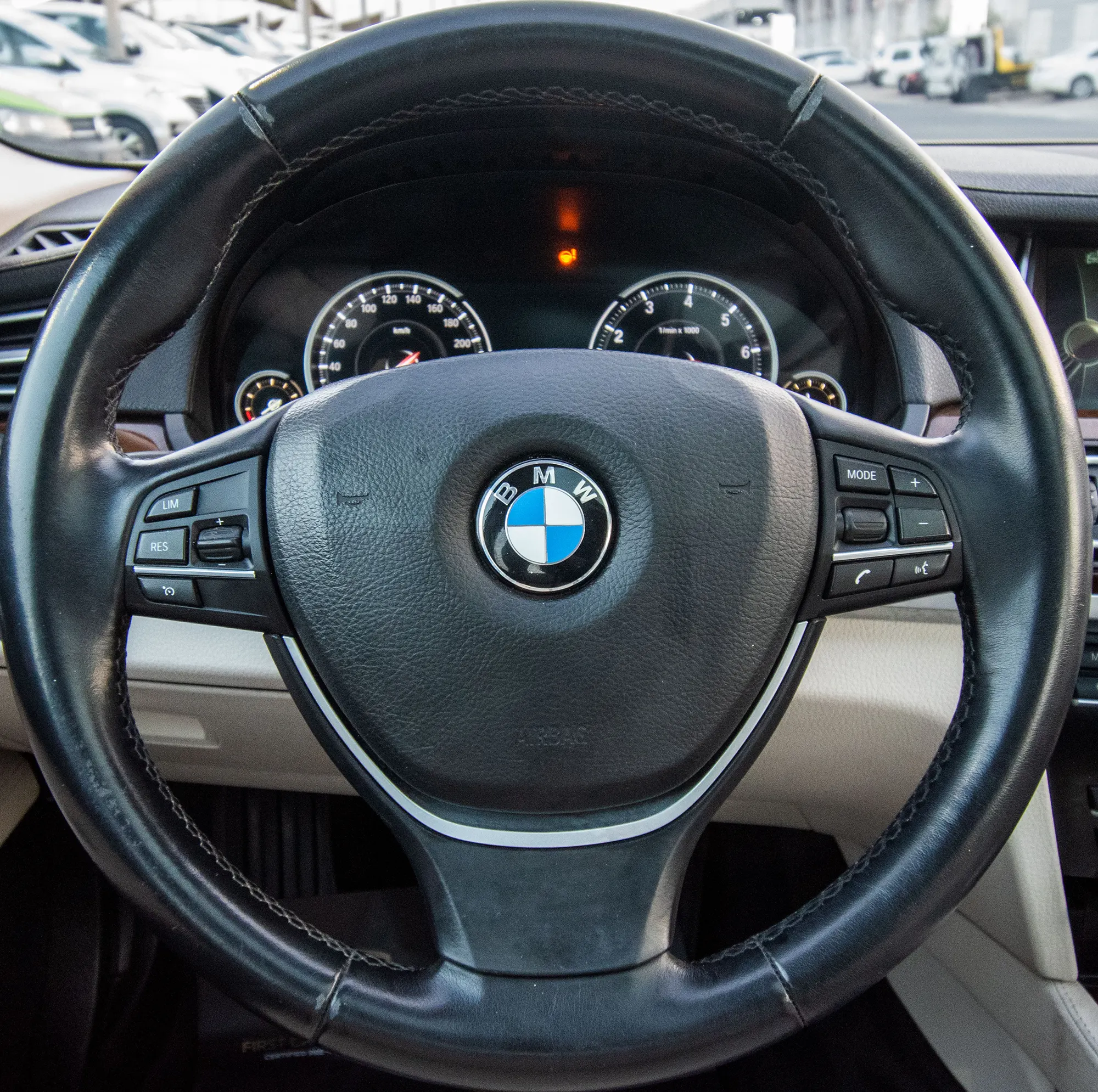 Used 2013 BMW 7-Series 750Li Gold – Steering Wheel & Instrument Cluster at First Choice Cars Sharjah